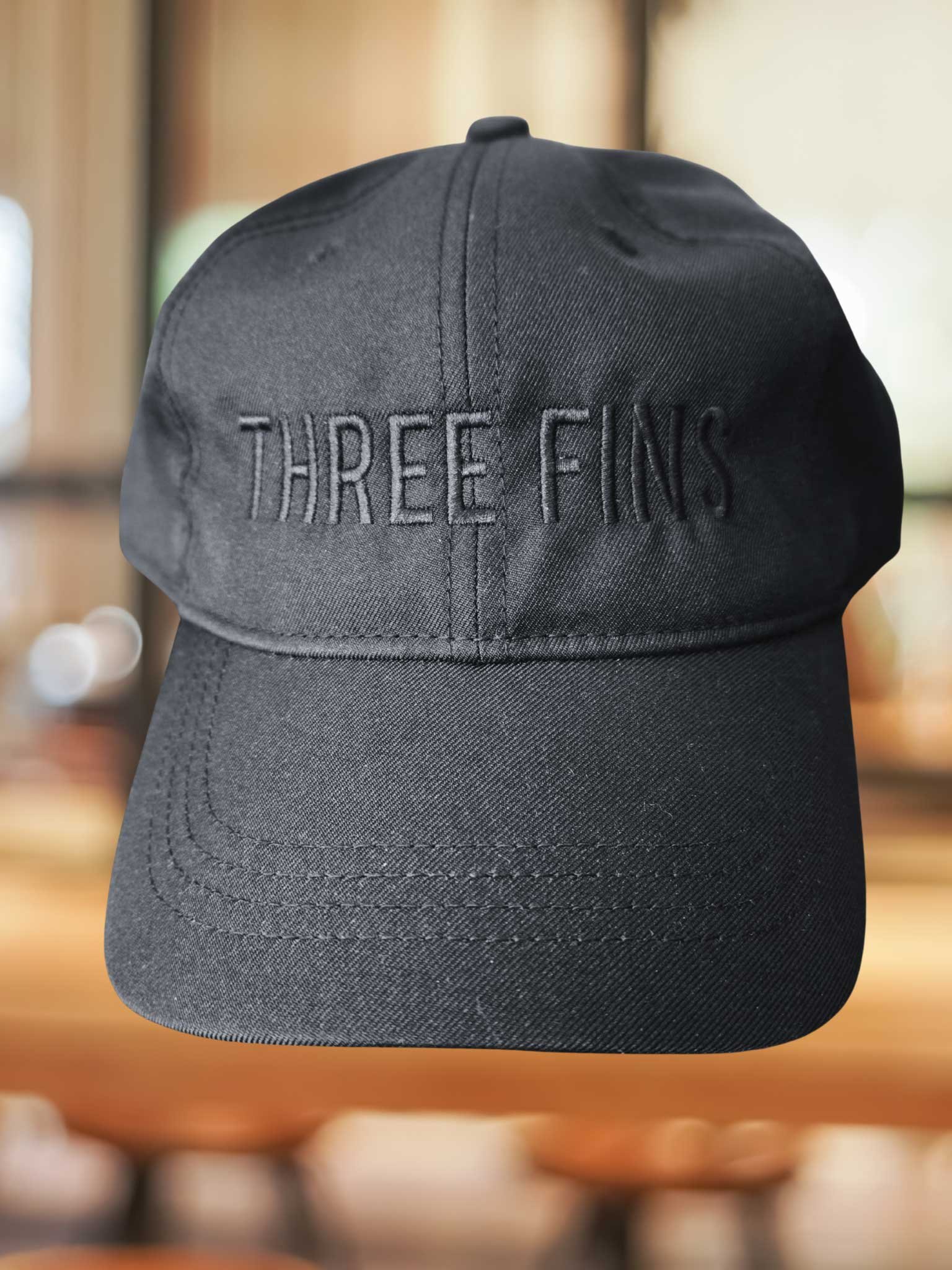 ThreeFins_Black_Hat_Front.jpg