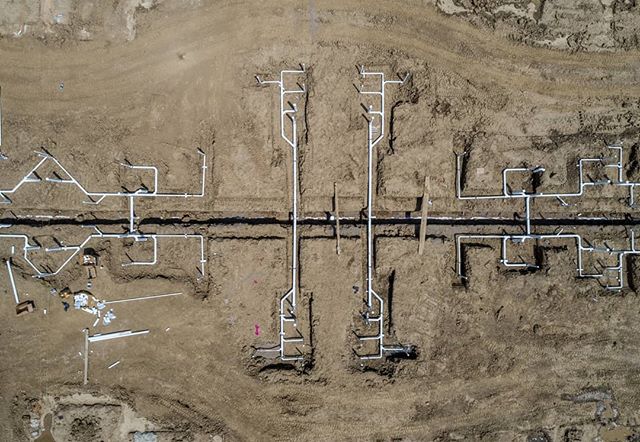 Symmetrical pipes being installed for an apartment complex.
.
.
.
#dronephotography #drone #djiglobal #fromwhereidrone #drone_countries #explorecreate #beautifulplaces #droneofficial #skypixel #skyhilife_drones #gameofdronez #dronedose #dronespace #d