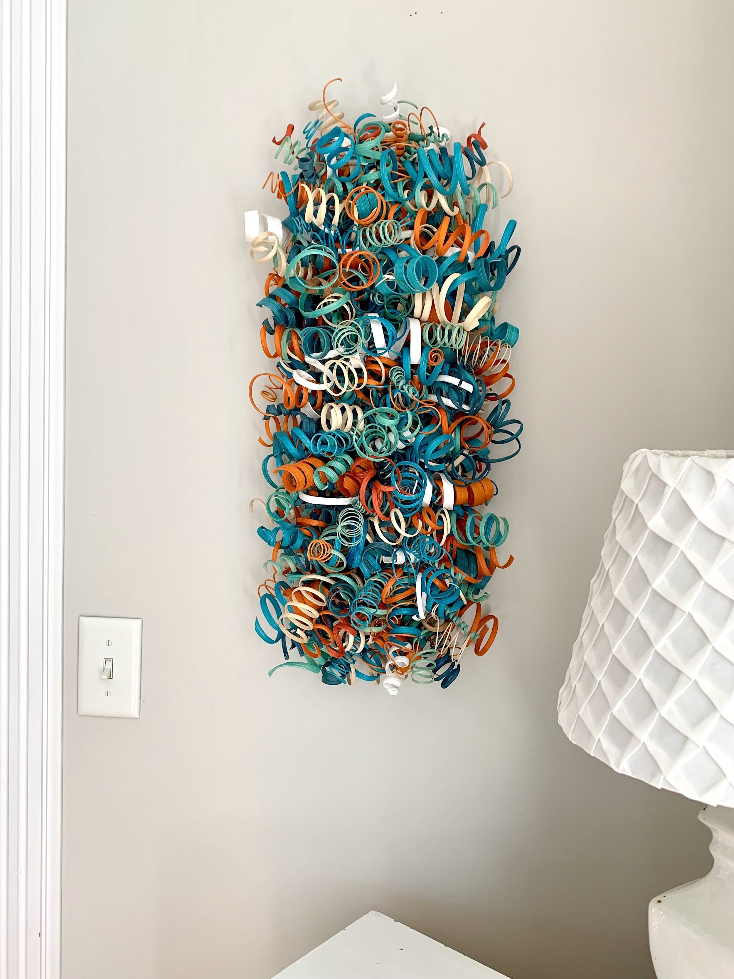 Entire handcrafted wooden wall art with coastal and contemporary flair