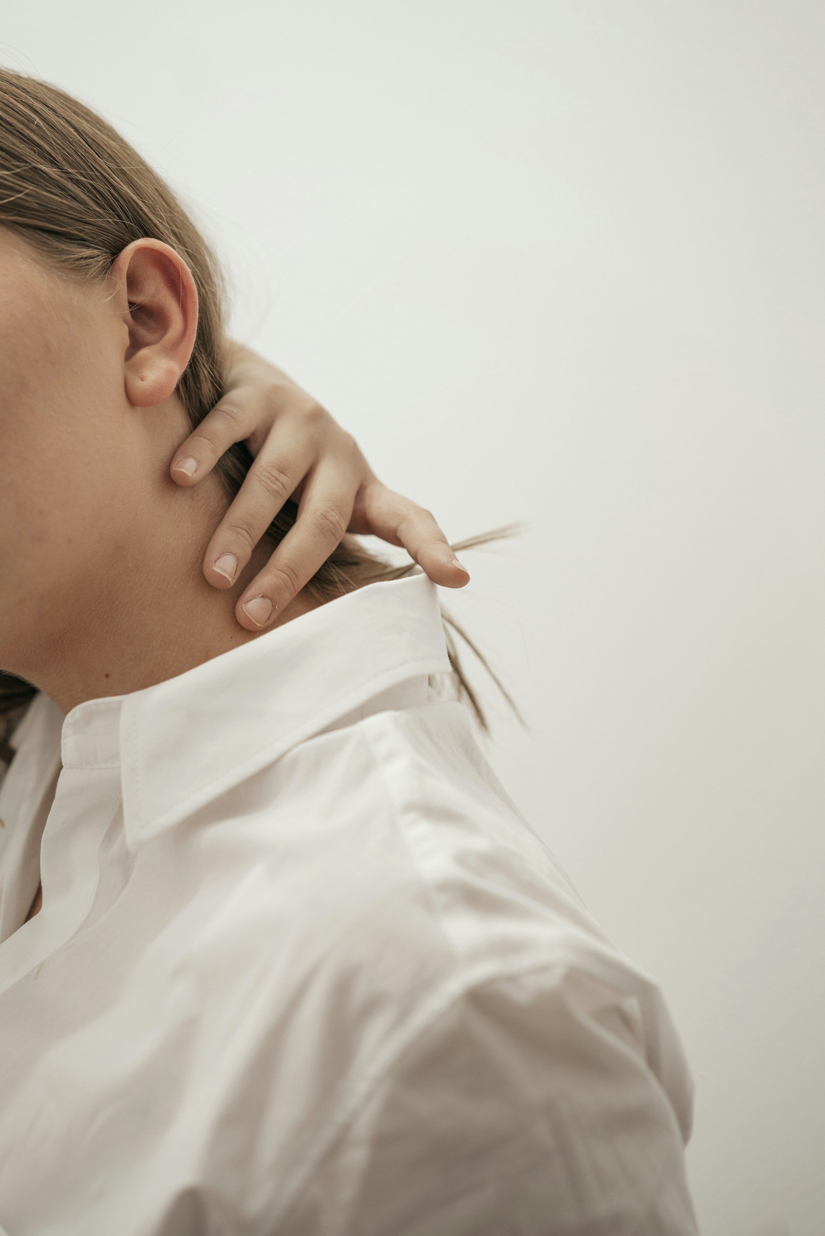 Precision structural pain relief for chronic neck pain and upper back tension in Woodbury, NY.