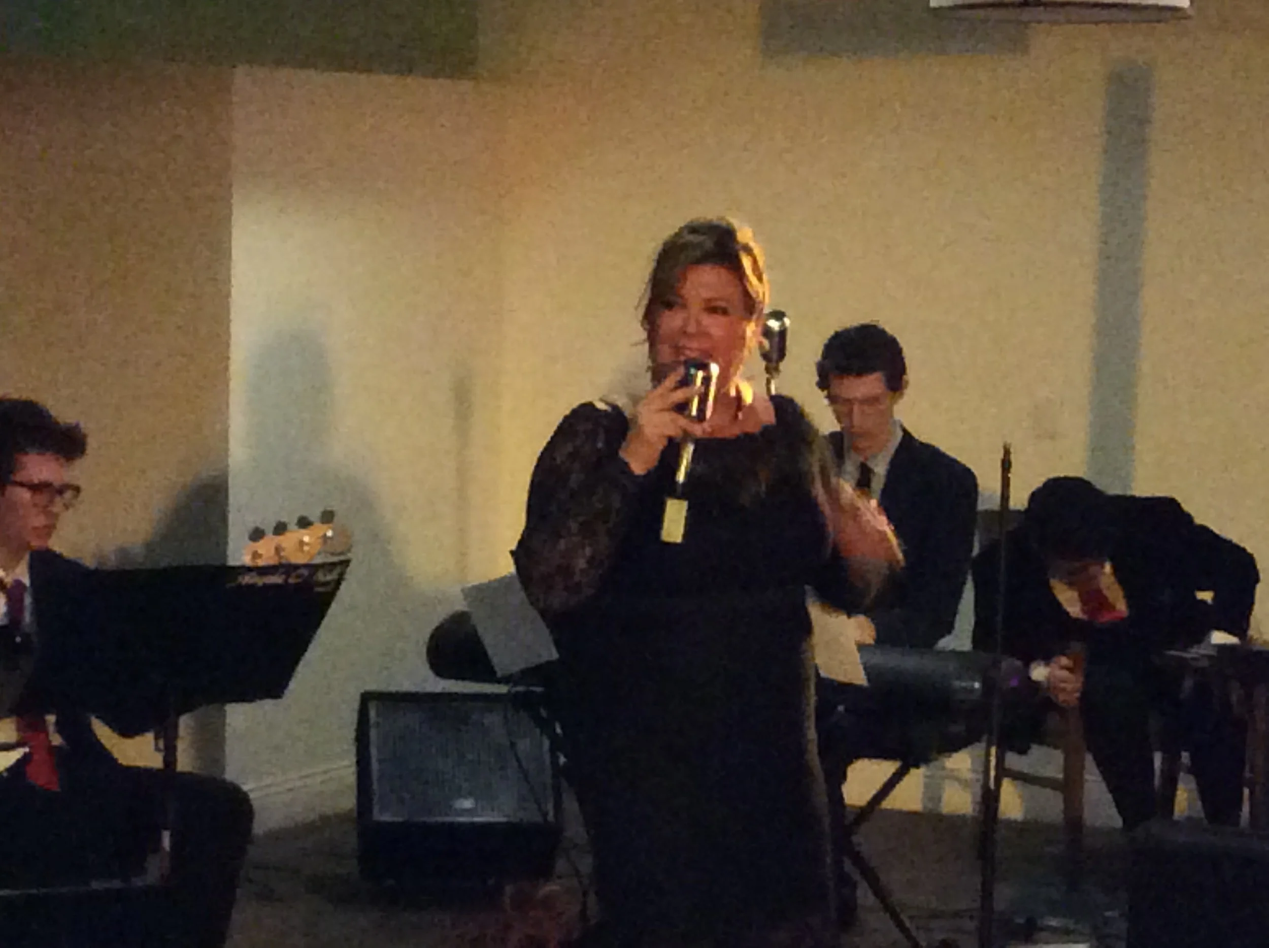 Angela O'Neill and the Outrageous8 New Year's Event