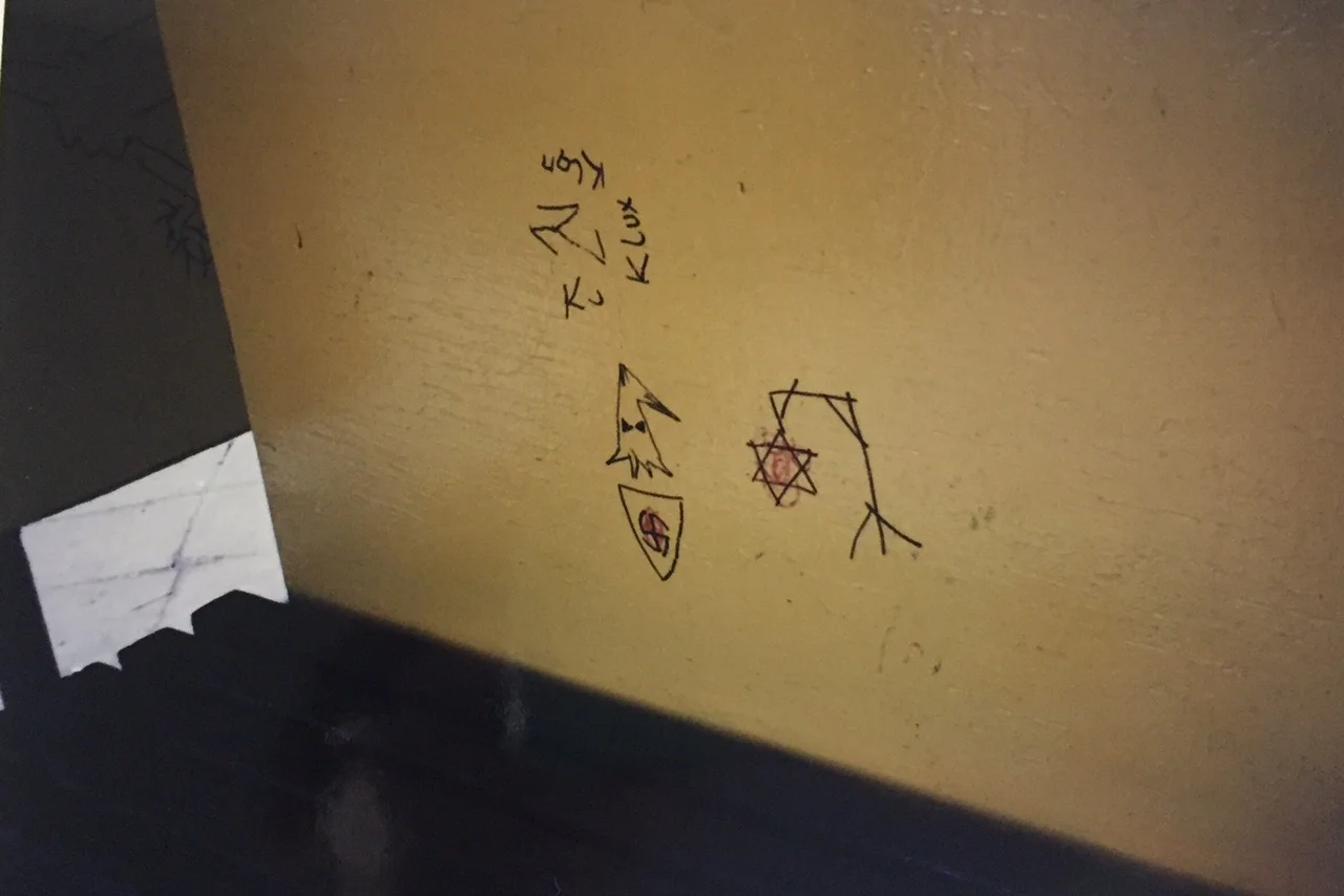 At the bus stop right outside the concentration camp. Anti-semitism and racism alive and well in 1990s Poland.