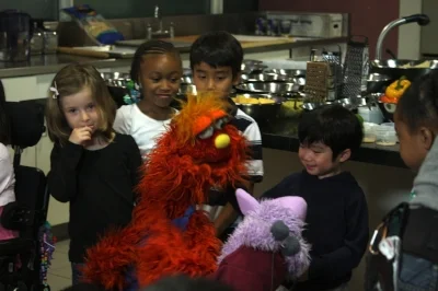 My little student is so happy to talk to the puppets. 