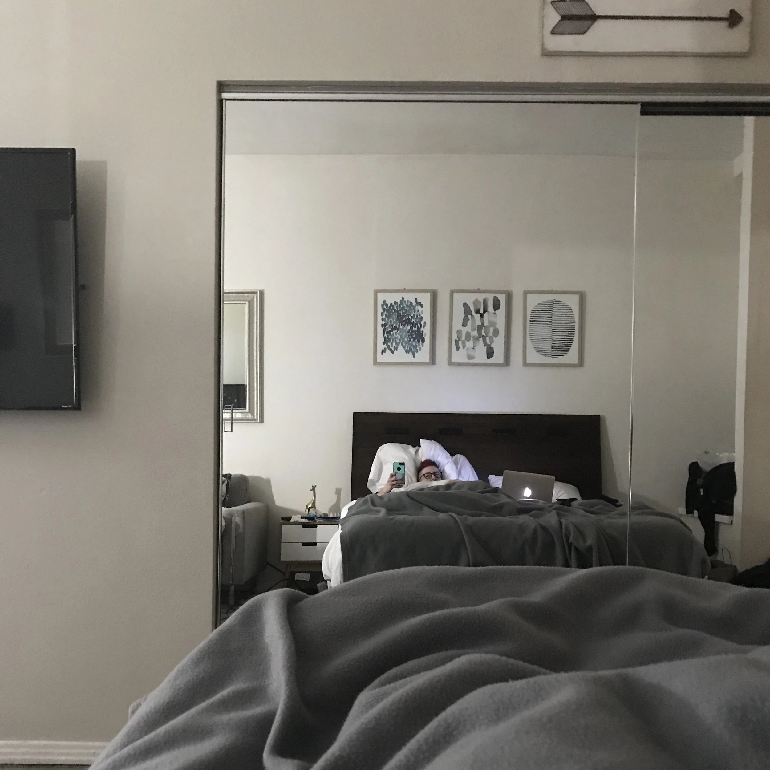 this photo perfectly illustrates my life for many hours of the week. i do what i can on my computer, but sleep a lot.