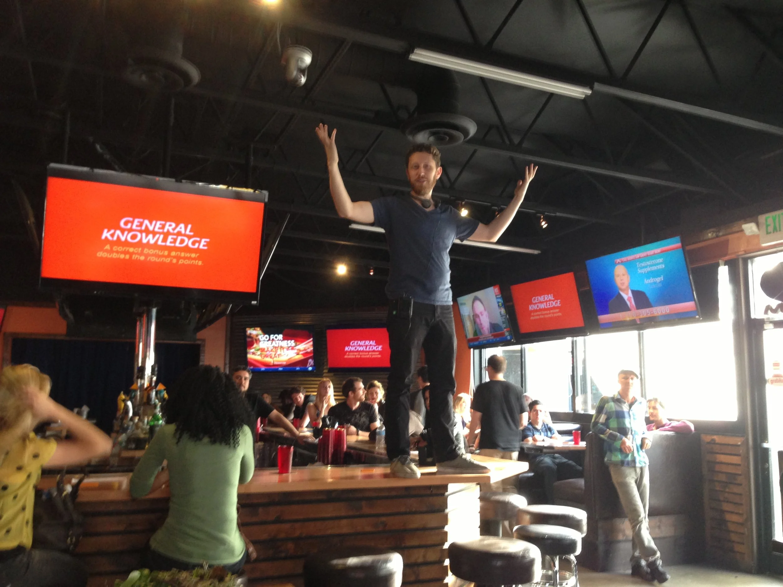  Being the director means you get to stand on the bar. 