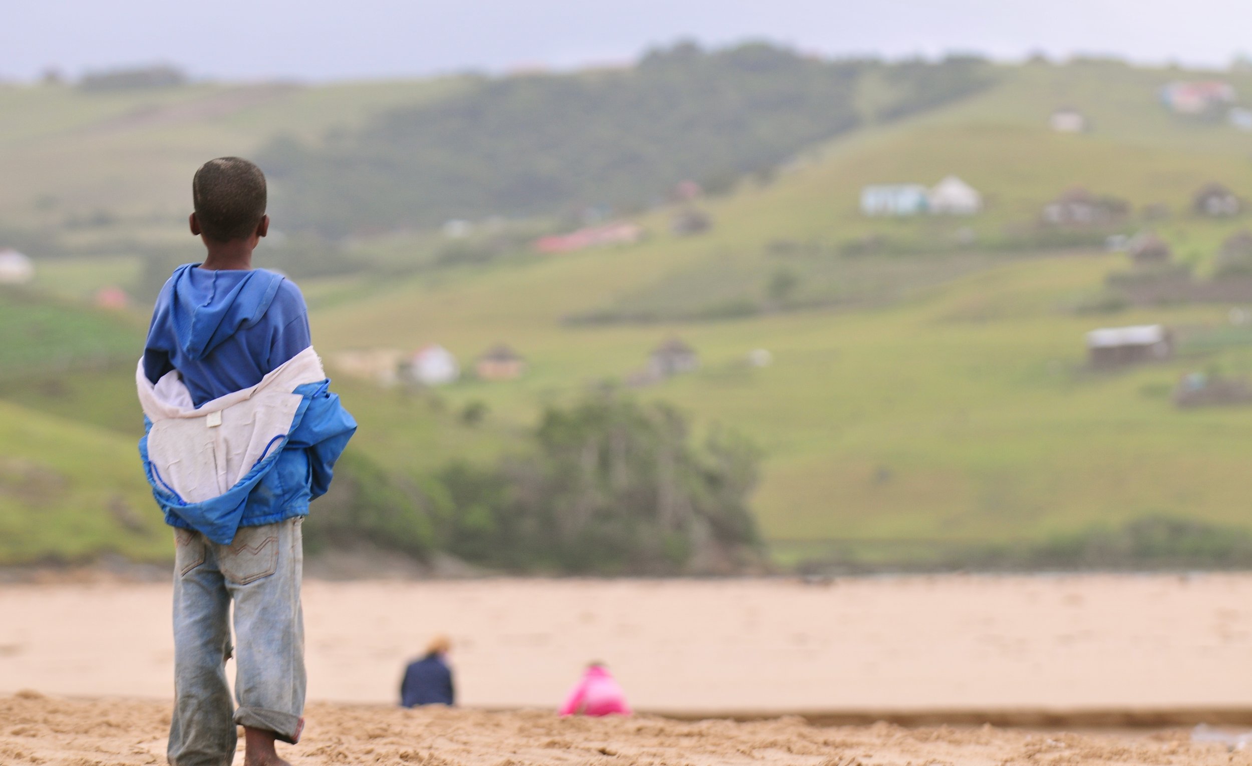 nqileni-village-boy-on-the-beach_6441406895_o.jpg