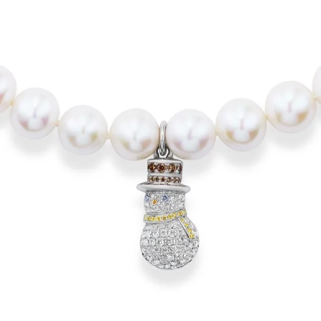 Pearl necklace with a diamond-encrusted snowman pendant