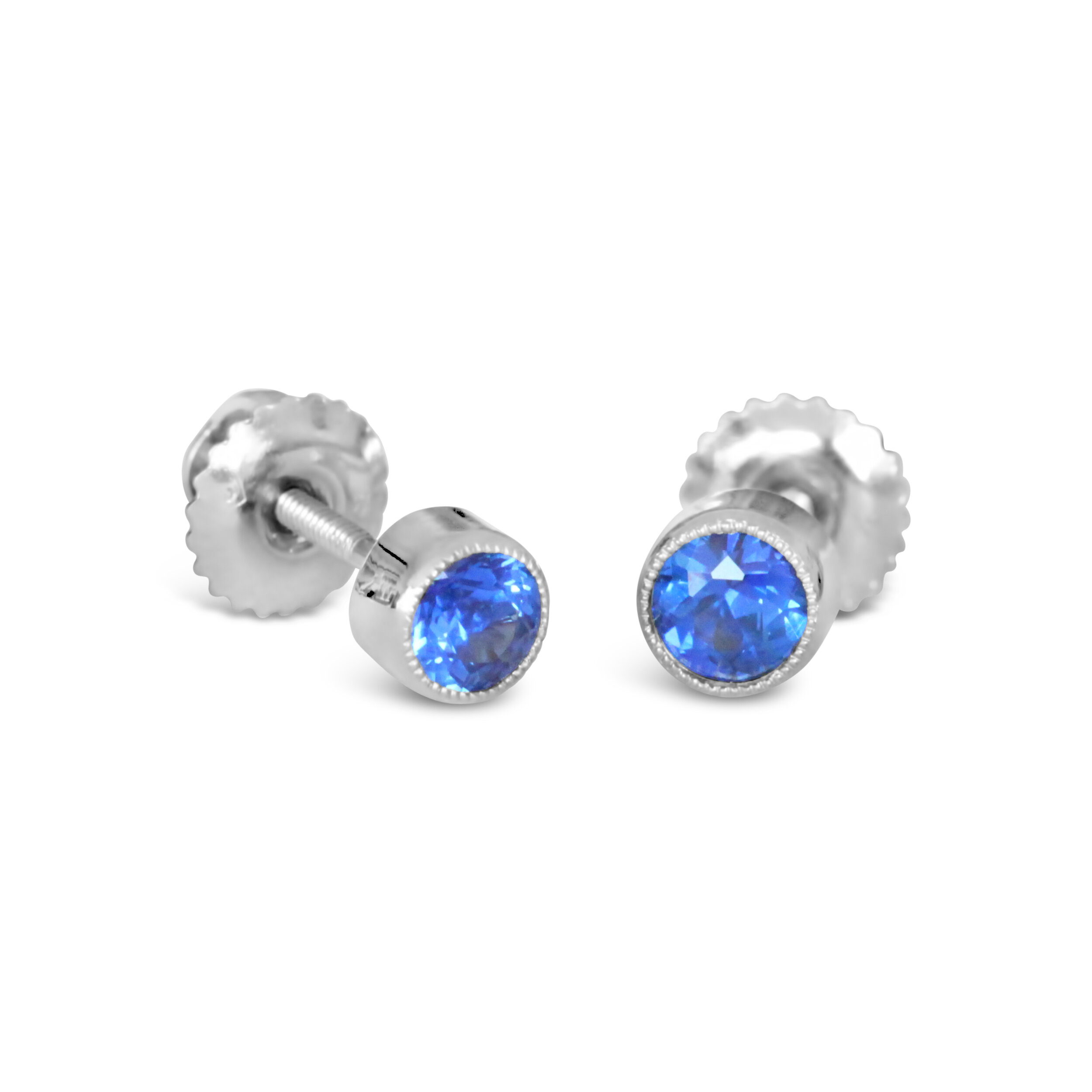 A sapphire bezel studs.jpg