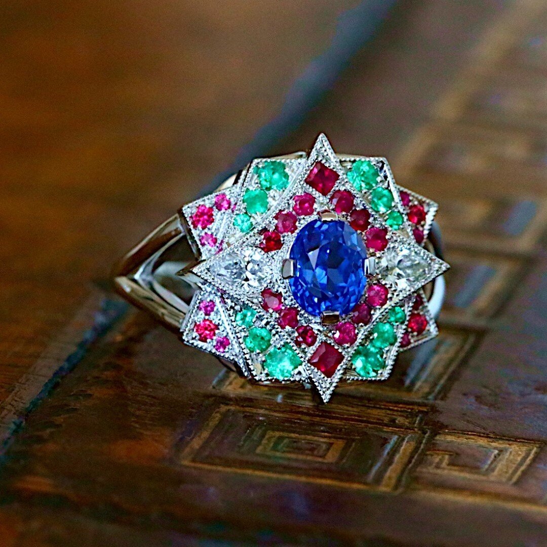 Getting ready for the fireworks! 🌟✨⁠
.⁠
.⁠
This colorful cocktail ring, set with a fine unheated sapphire and accented with rubies, spinels, emeralds and diamonds, is a recent bespoke creation (= not for sale). ⁠All crafted in platinum. ⁠
.⁠
It is a