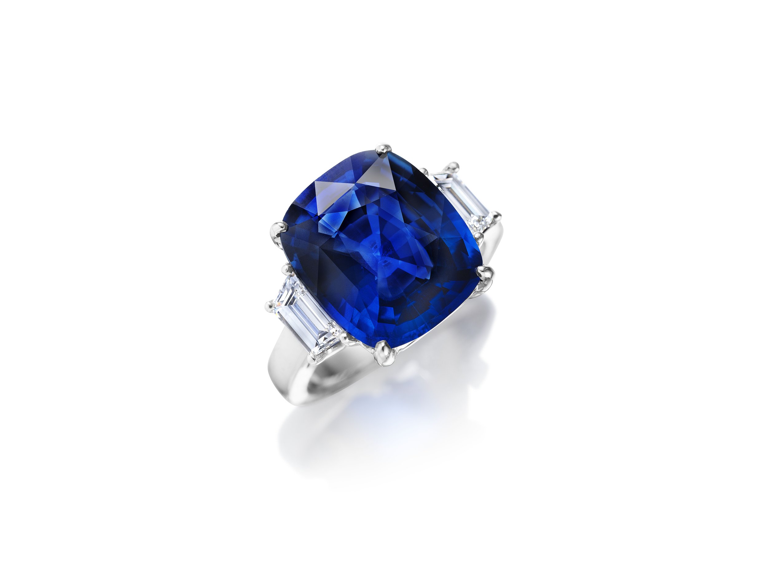 Unheated Burma sapphire three stone ring 8 carat.jpg
