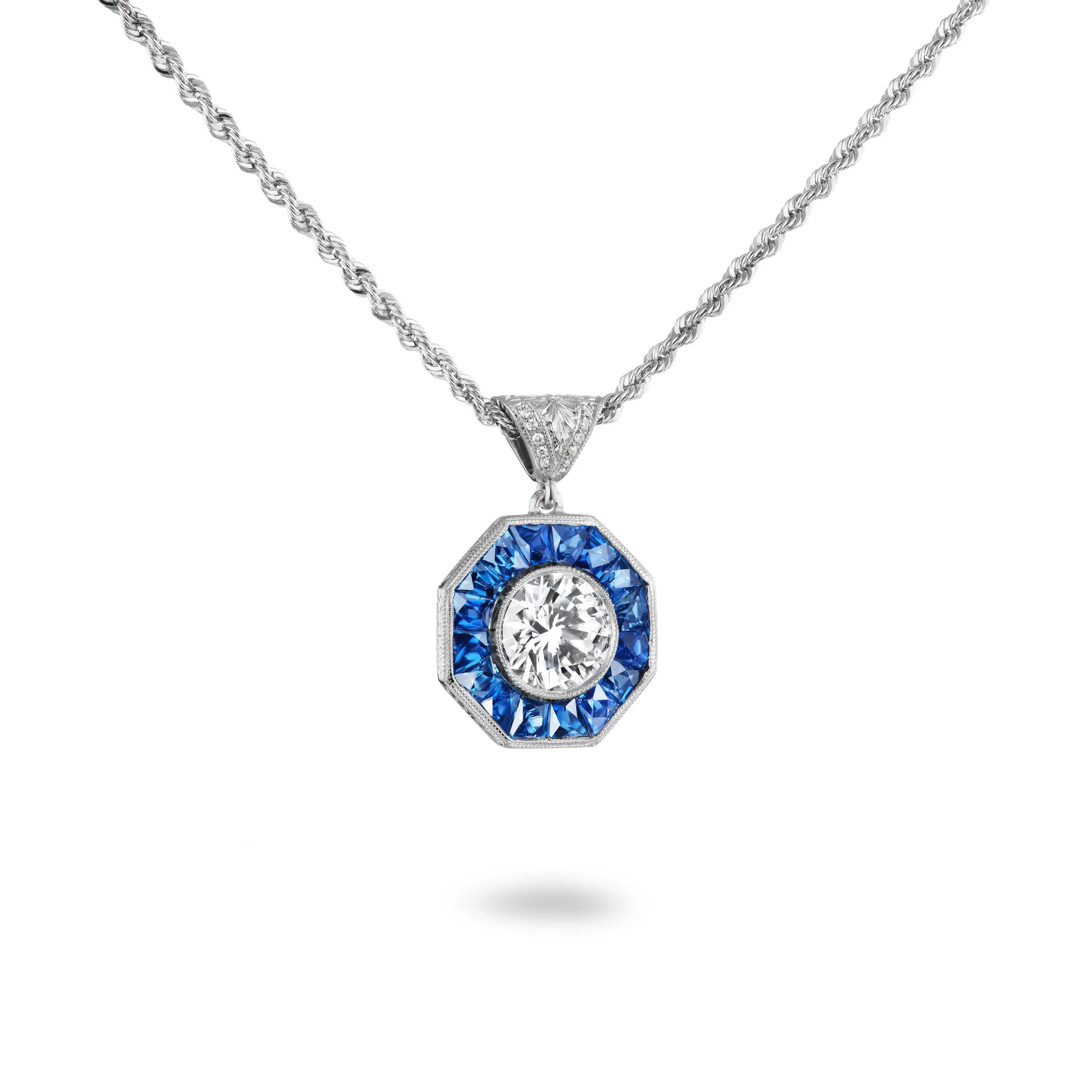 Bespoke Diamond Calibre Cut Sapphire Platinum Pendant.jpg