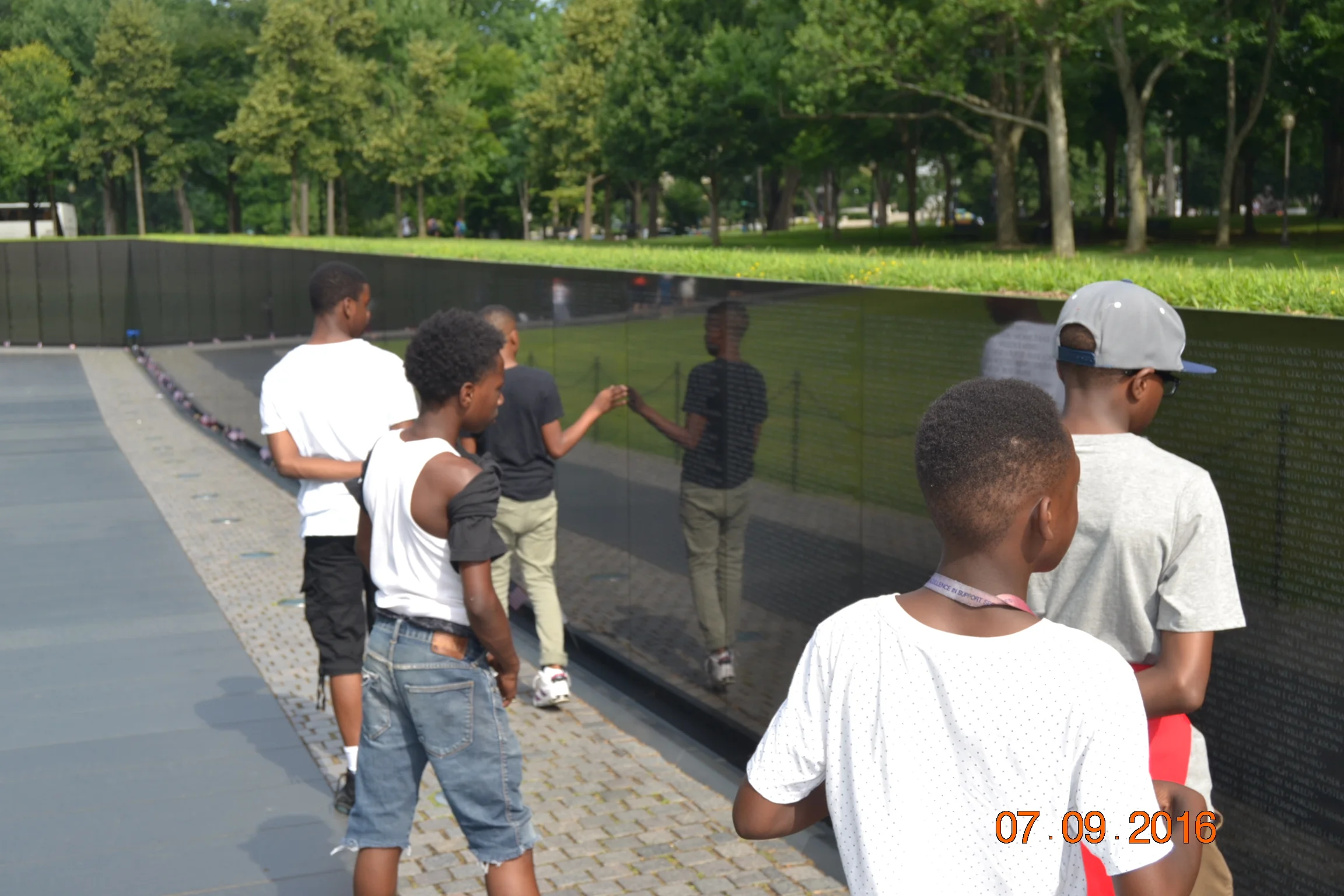 vietnam wall reading.JPG