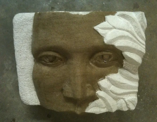 "Growth" is the first face I ever carved. Not bad, but needed some work You can see I avoided the mouth!.