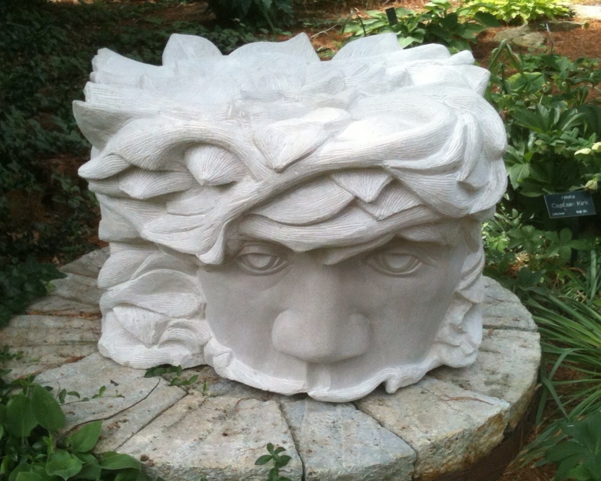 "Sylvanus" is the second face I carved. Again, I avoided the mouth. It is still very flat, but the eyes are more even. This piece is also very large scale so it was easier.