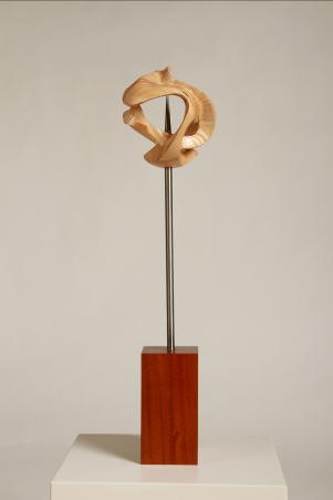 "World Pierced By War" a Wood and Steel Sculpture by Mike McCarthy