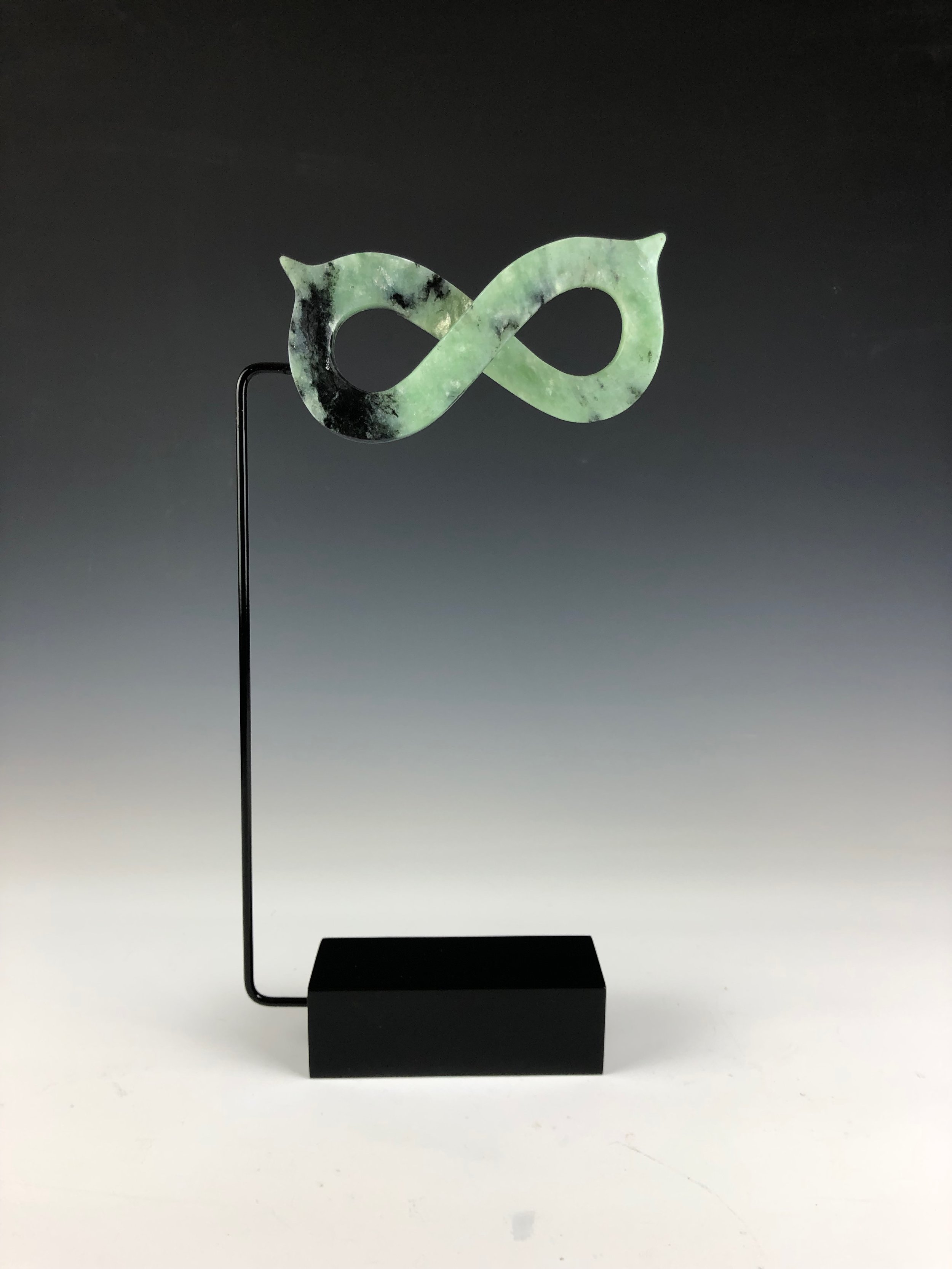 "Masquerade" is a Soapstone Sculpture Carved by Mike McCarthy