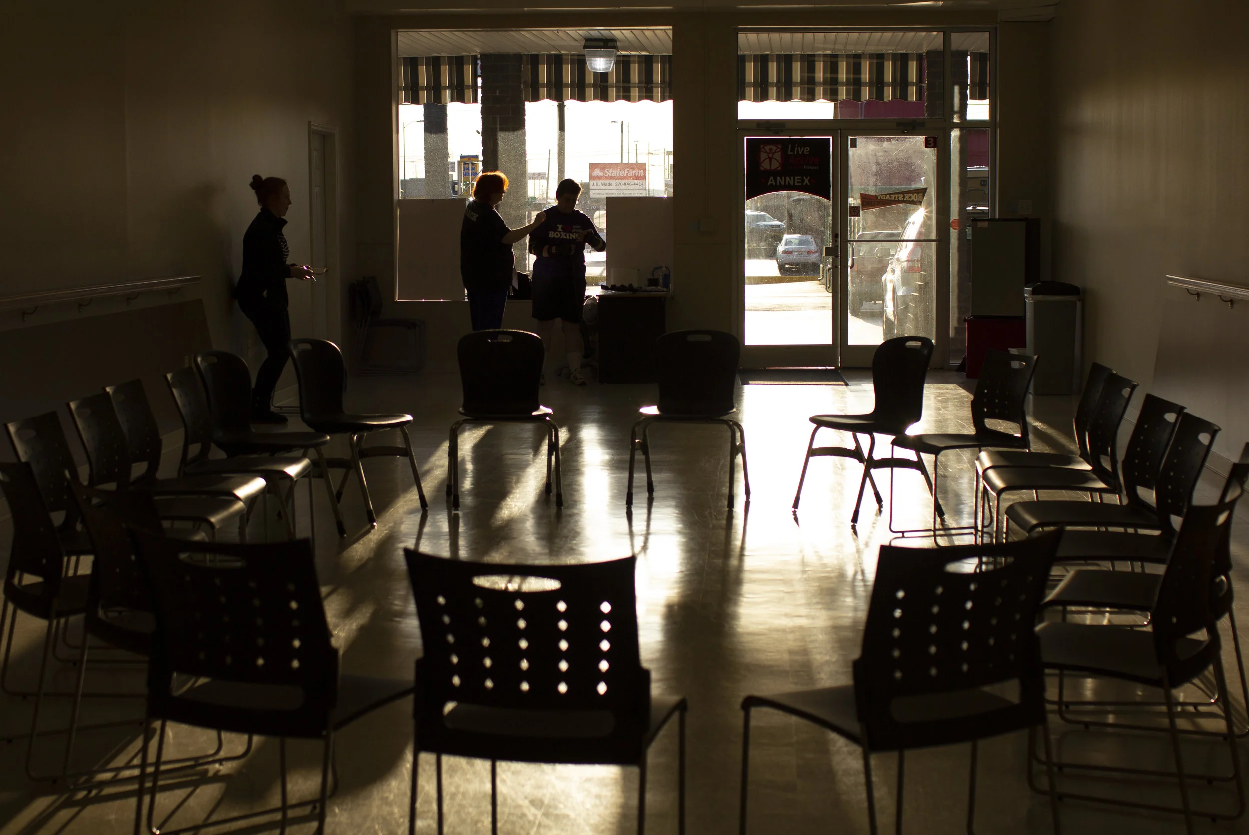  Rock Steady Boxing coaches Jill Steffey and Maureen McIntyre set up chairs for a beginning prayer Jan. 2 2017. Rocky Steady was created to help the motor skills of people with Parkinson's. "While they're looking for a cure," Steffey said," we can do