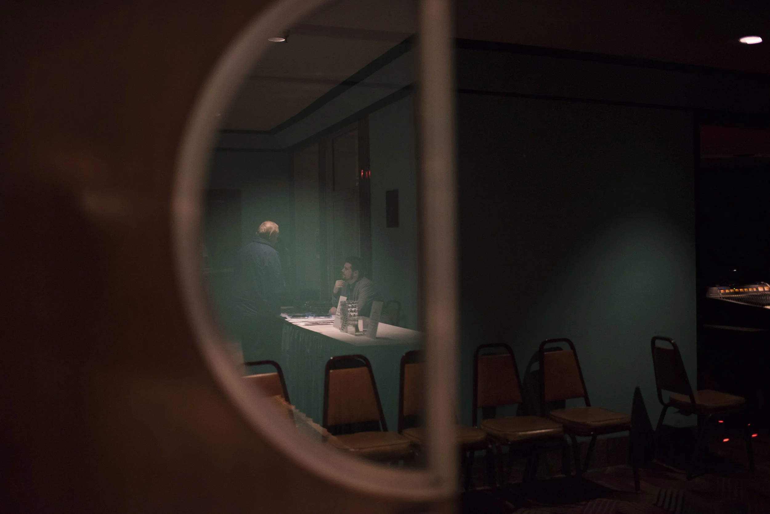 Director of the documentary “Score,” Matt Schrader, talks to an usher in the lobby while he waits for his movie to end. “Score” was screened at The Capitol theater in Bowling Green KY October 24, 2017. 