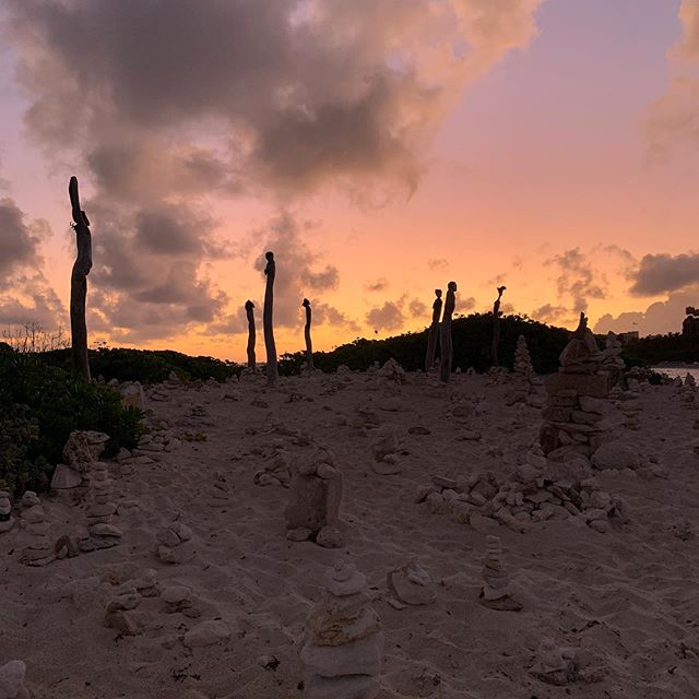 Sunrise beach walk to the Sacred Space, seven statues carved from driftwood and donated by the ashram to honour the Bahamian culture.