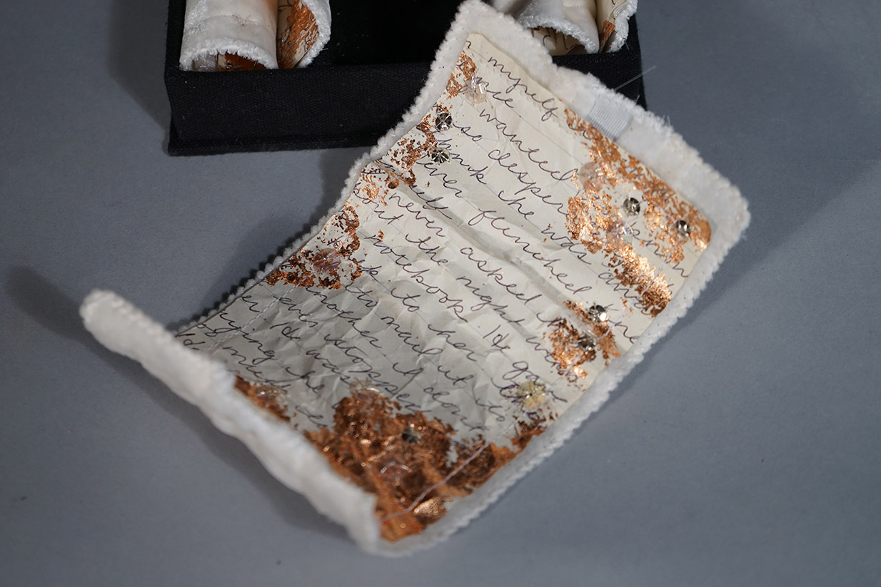  Leather, waxed linen thread, black canvas, locks and keys, diary excerpts, bronze leafing, sequins, cotton quilt batting and Davey board. Box: 5” x 4” x 1 1/4”. Pages: 4” x 6”. 2016. 