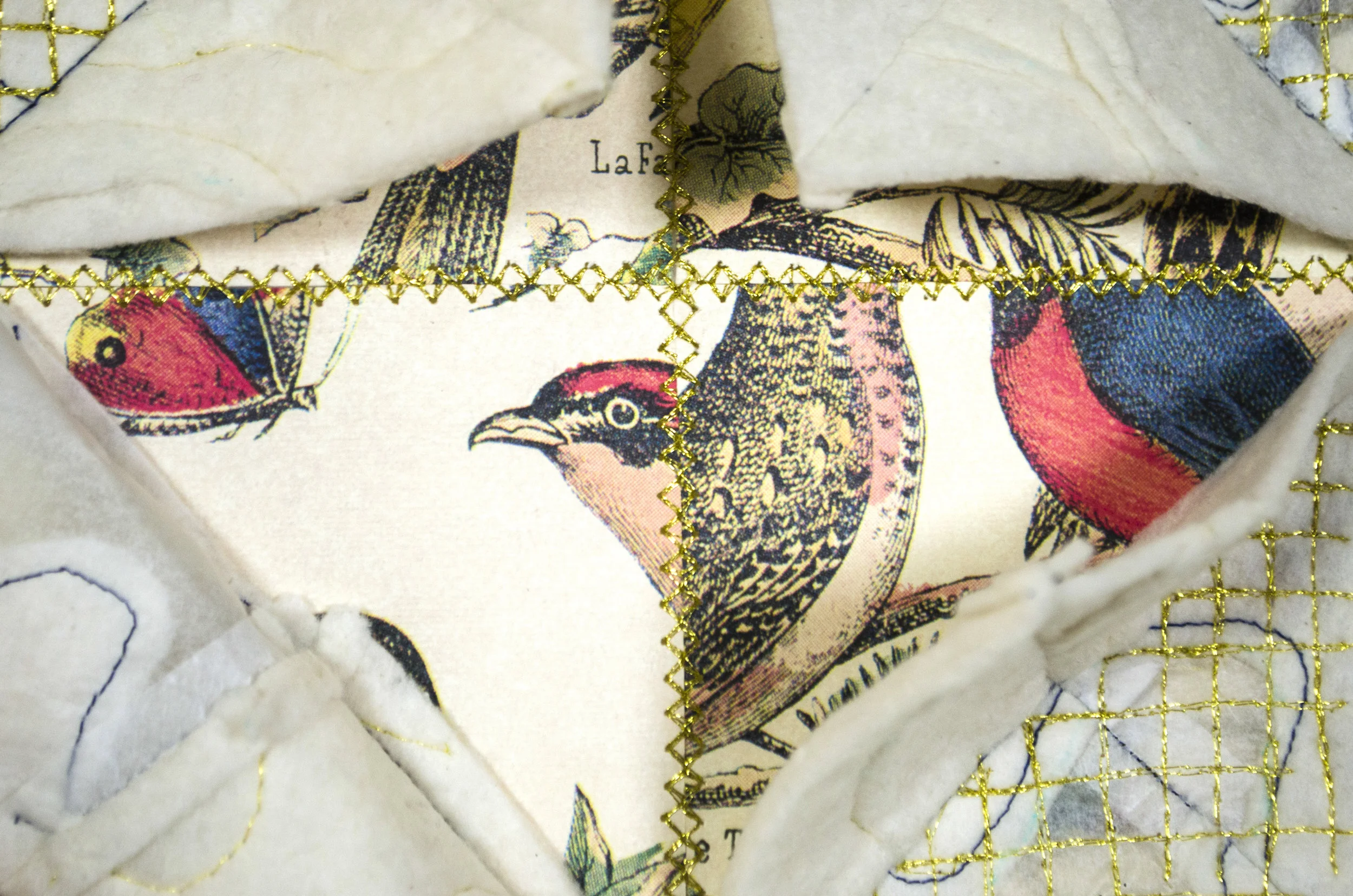  Cotton quilt batting, found images, and tracing paper stitched together with metallic thread. Four 6” x 6” sections. 2016.  