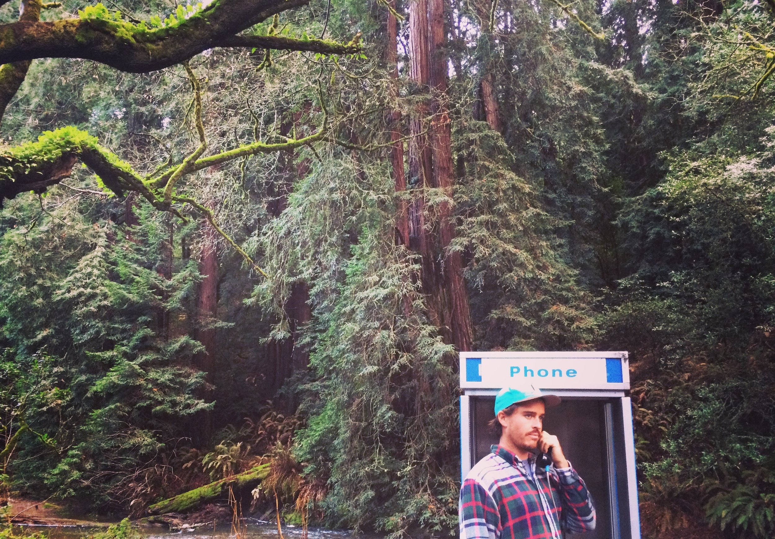 Mikey James taking a business call on Vine-Island, 2015.