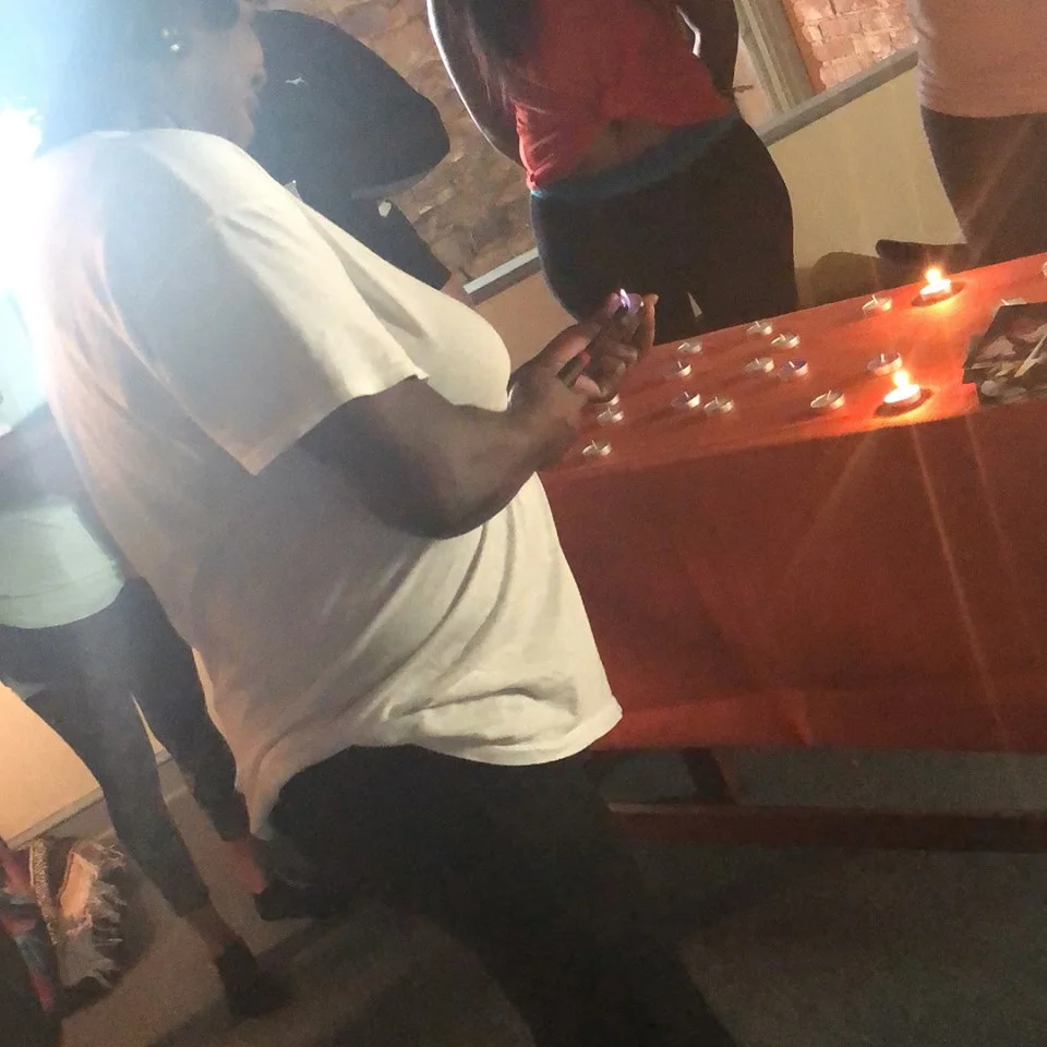 Lighting candles at our Circle of Remembrance