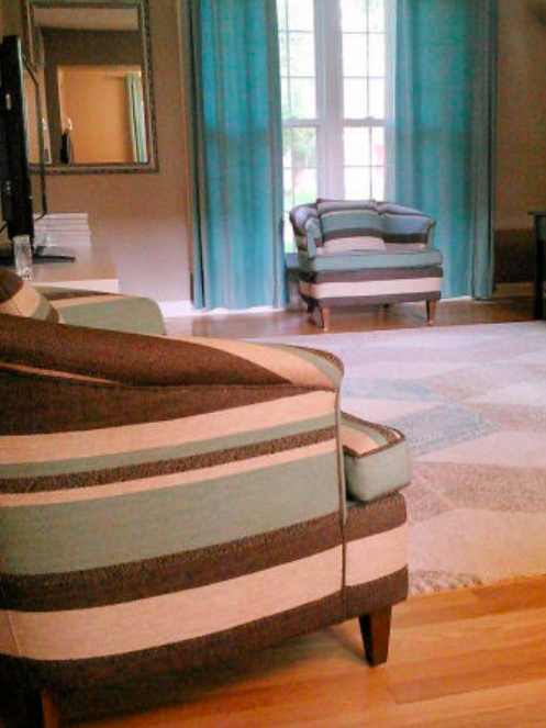 These barrel chairs received a bold new stripe by Barrow Fabrics. Lining up the patten was a challenge, but one we quite enjoyed tackling!