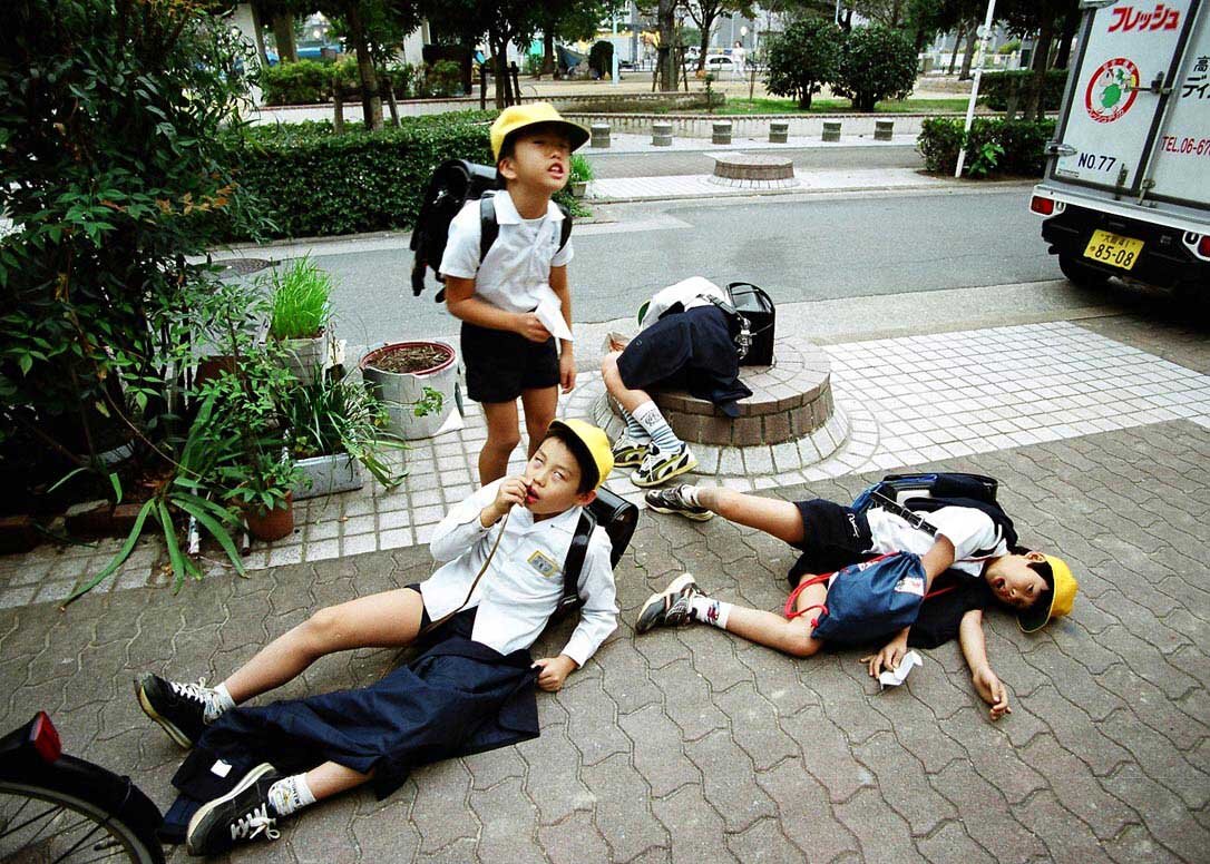 Japanese sexy girls posing on professional photographer's camera