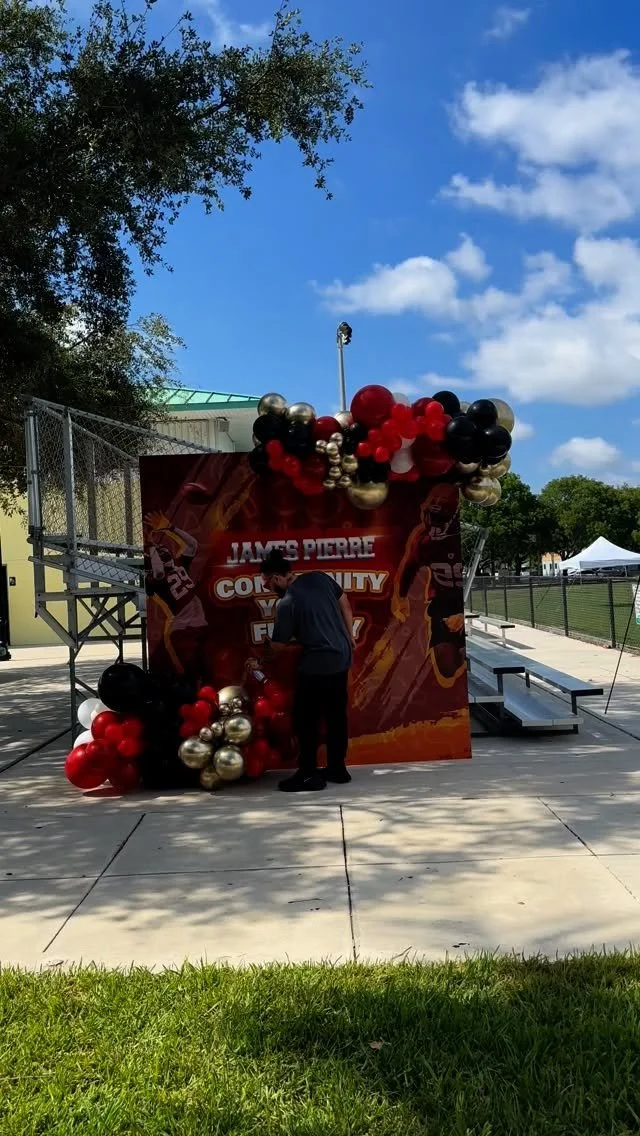 A custom backdrop allows us to take our creativity to the next level by incorporating professional graphics. We don’t use canvas and we don’t use AI. This is 100% the work of a professional graphic designer. Then top it off with some Bal
