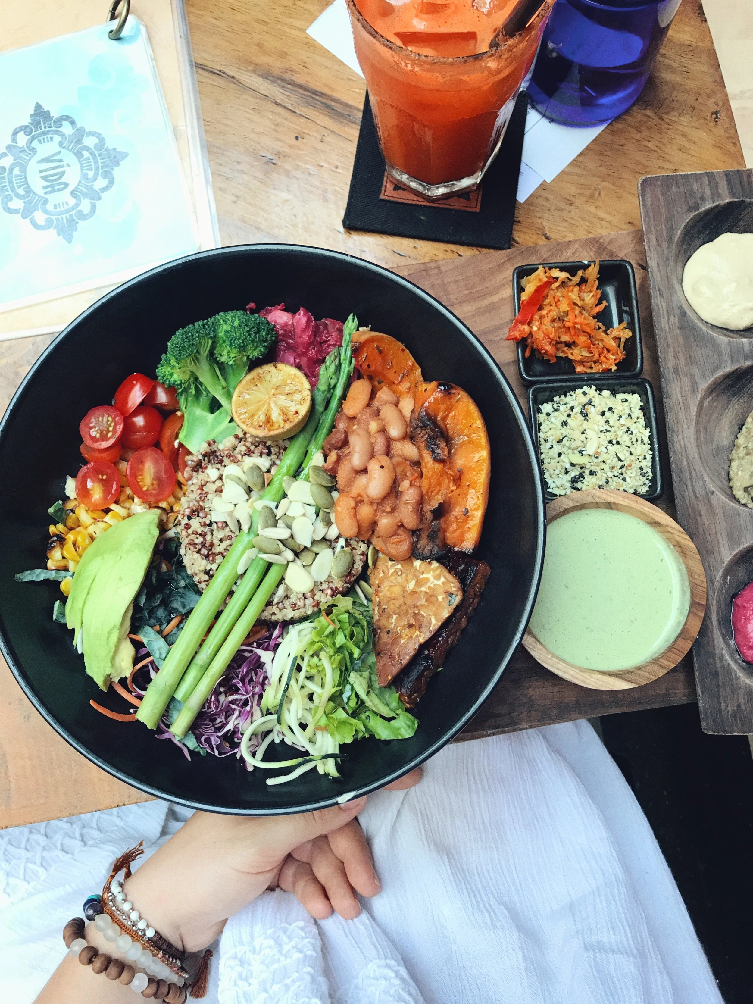 The healthy bowl. It is SO EXTRA. Gotta love a dish that offers an excess of condiments.