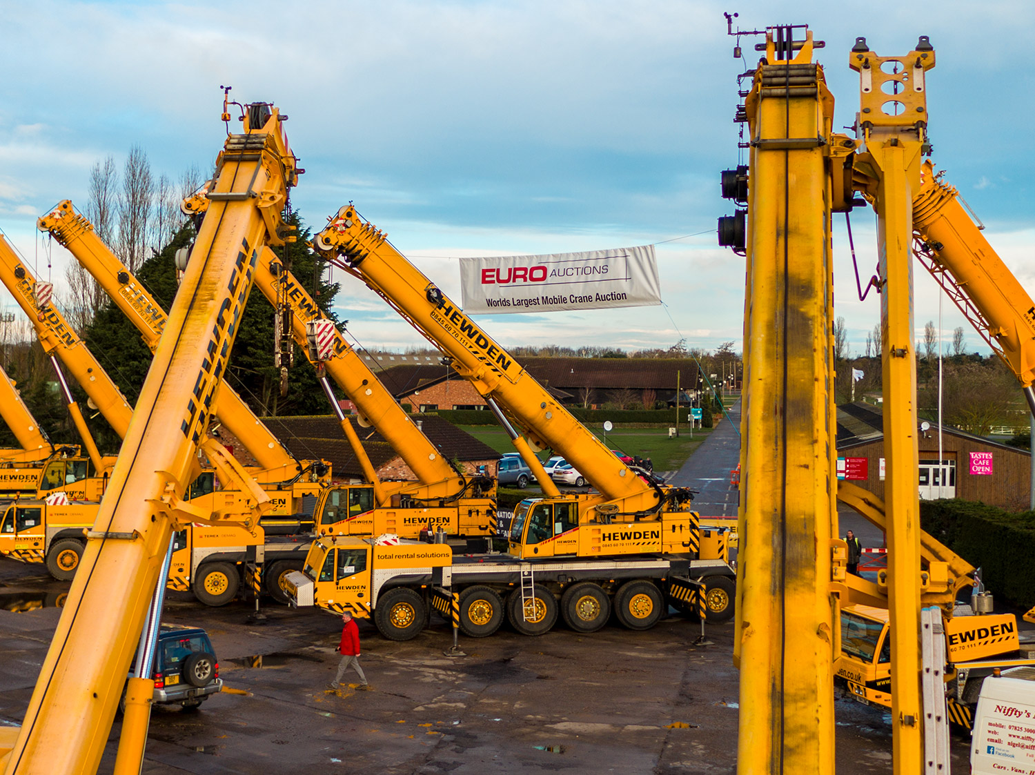 euro auctions banner with cranes
