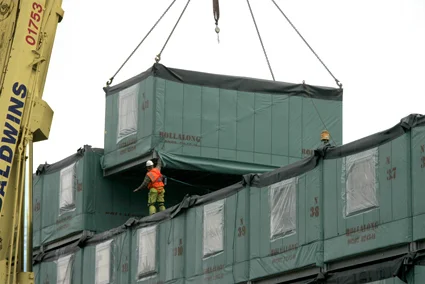 An example of prefabrication being lowered on site at Emma Phase 1