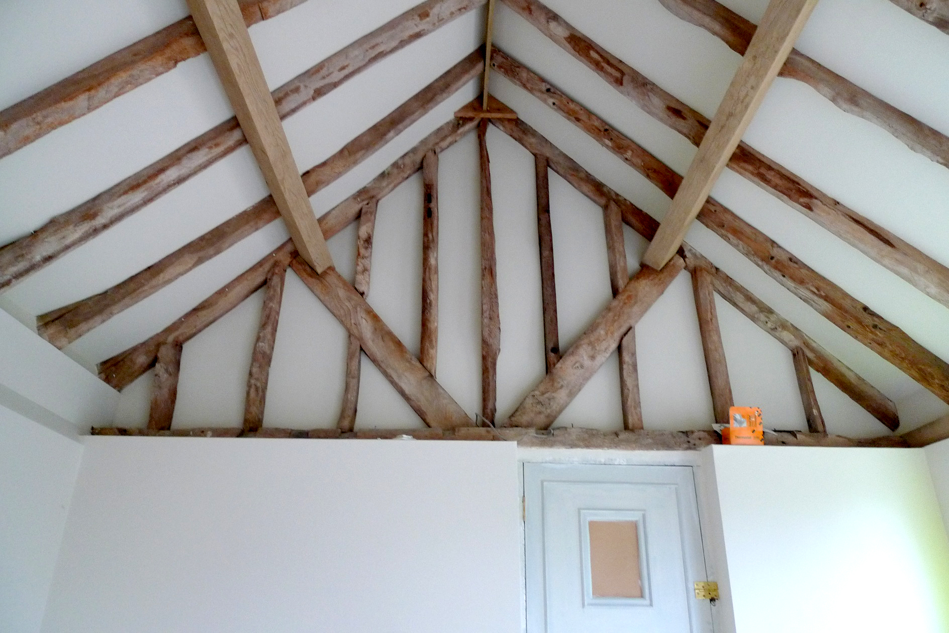 Timber trusses and frame retained