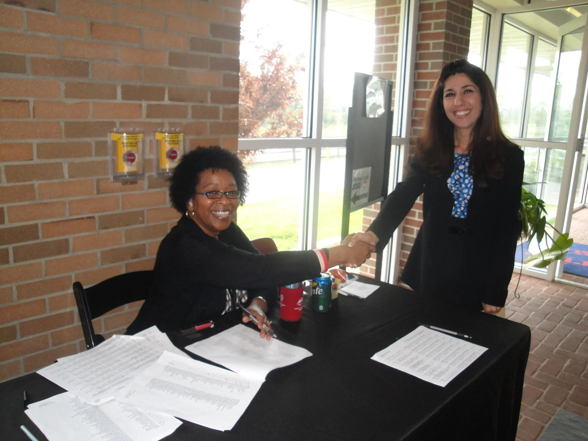 Latrice Lewis, FCWS Business and Employment Consultant  welcoming a client