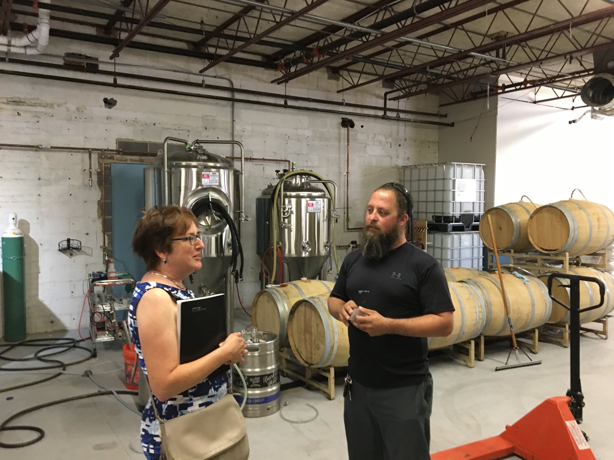 Tamar representing the State Commerce Department at House Cat Brewery in The City of Frederick
