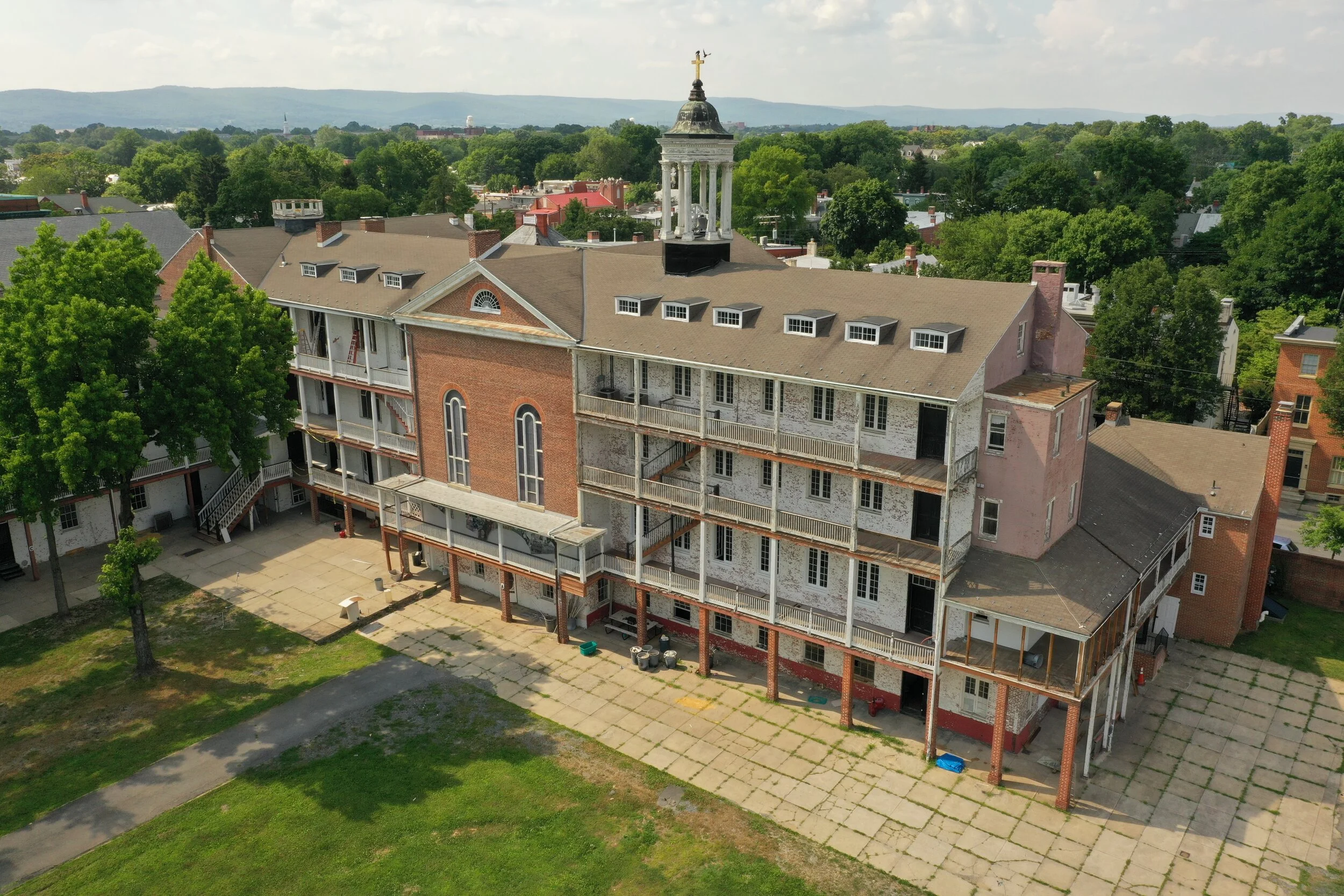 Aerial view of the Visitation campus, showcasing its historic buildings and lush green spaces..jpg