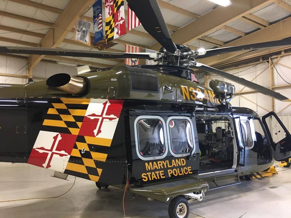 black helicopter with maryland flag on back of plane.jpg