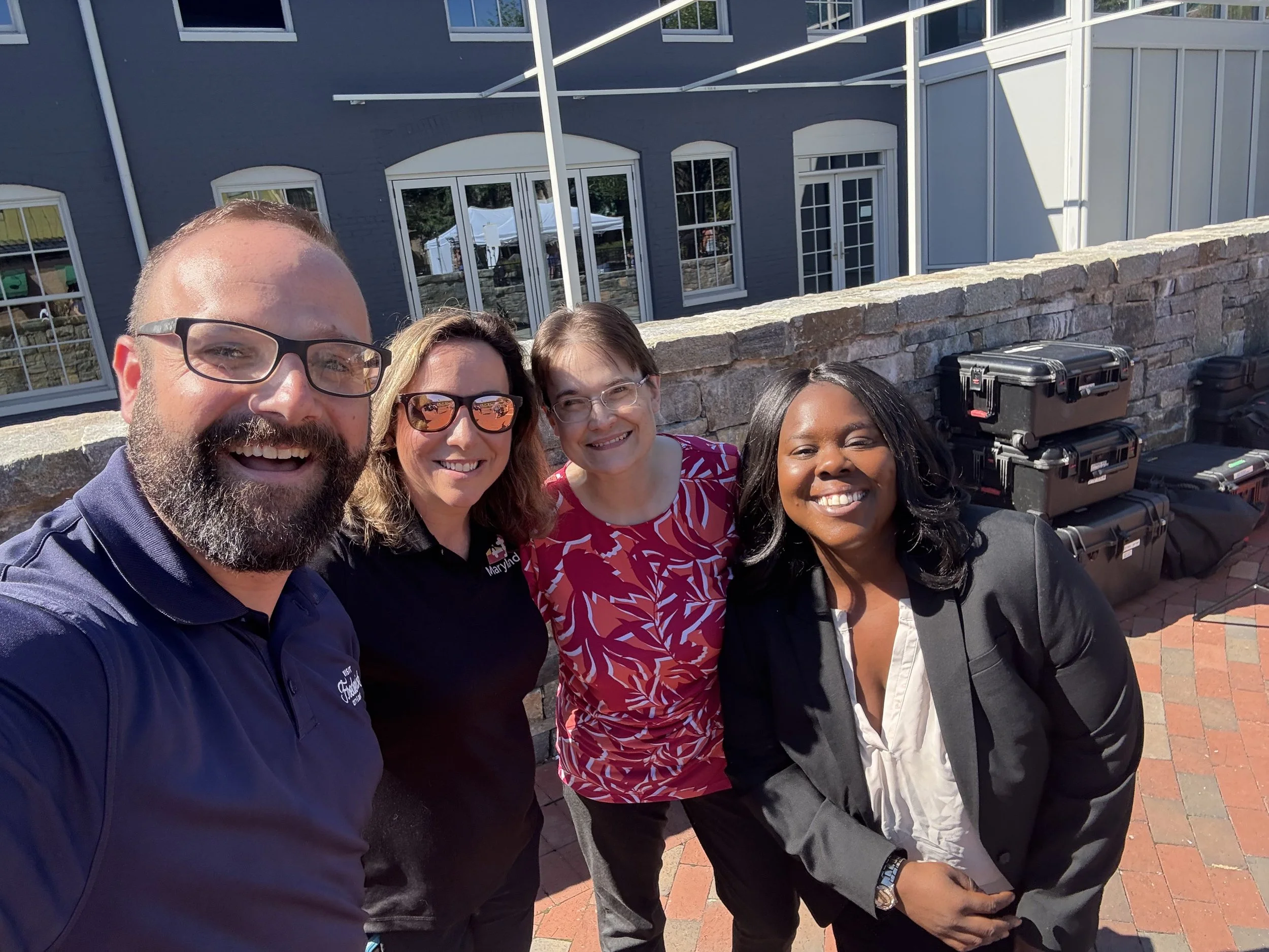  Carol attending a tourism-related event to boost Frederick City and County on Carroll Creek. 