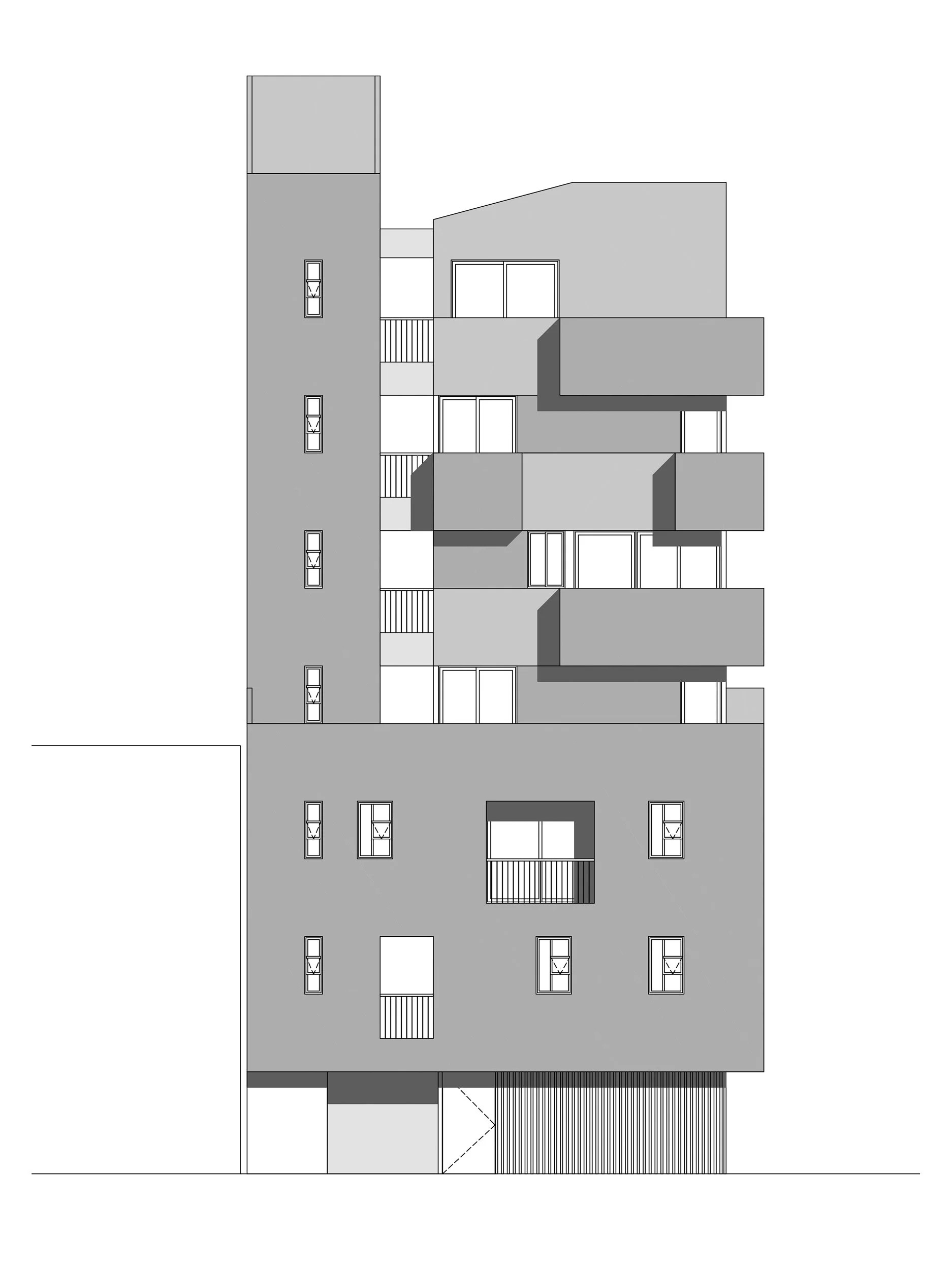 Fachada lateral del edificio de apartamentos Liv37 donde se ven los balcones en esquina y las ventanas horizontales.