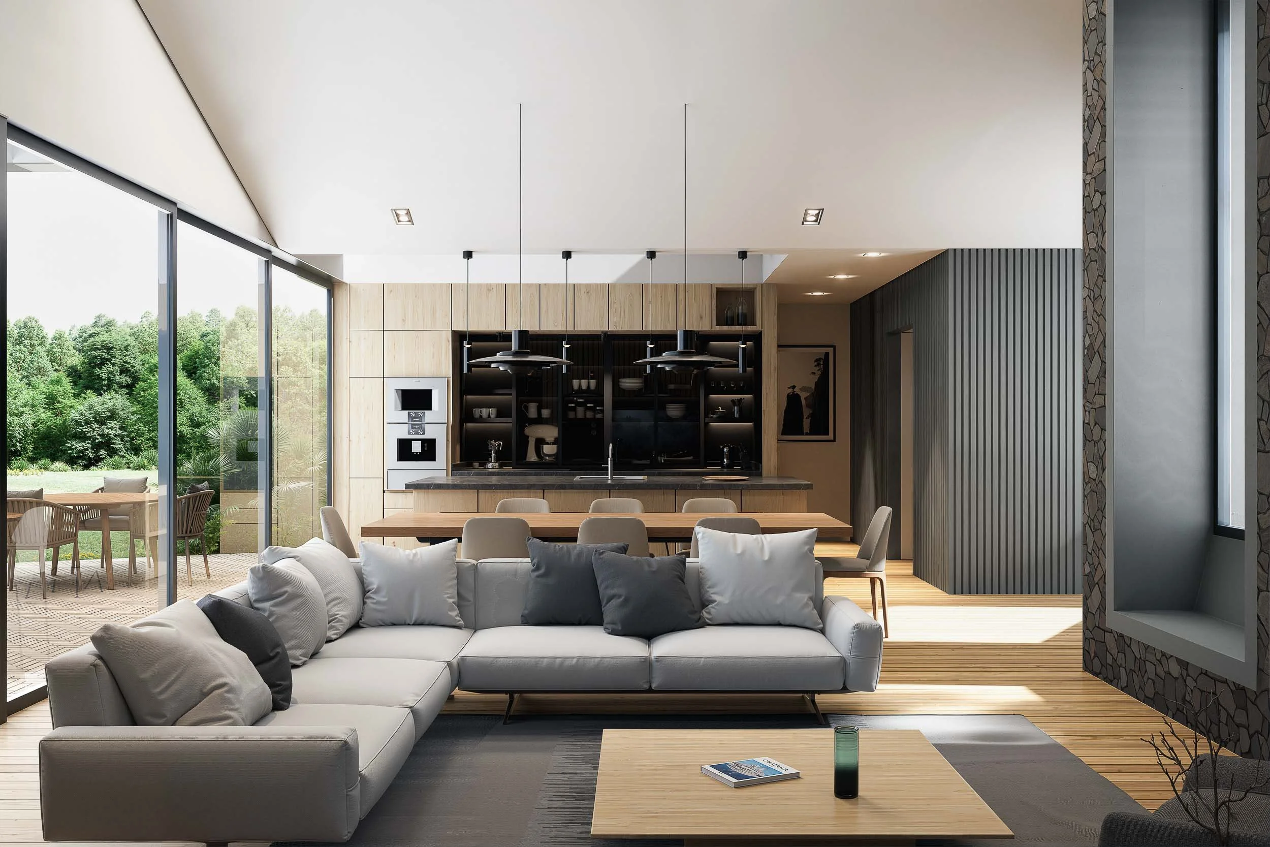 Sala con mucha luz natural y cocina de casa moderna diseñada por TOLEDO ESTUDIO DE ARQUITECTURA en el Oriente Antioqueño.