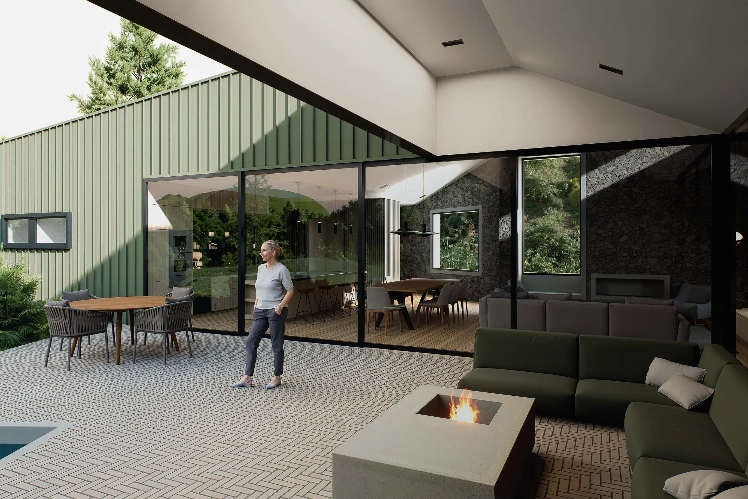 Terraza cubierta con fire pit en casa moderna diseñada por TOLEDO ESTUDIO DE ARQUITECTURA en el Oriente Antioqueño.