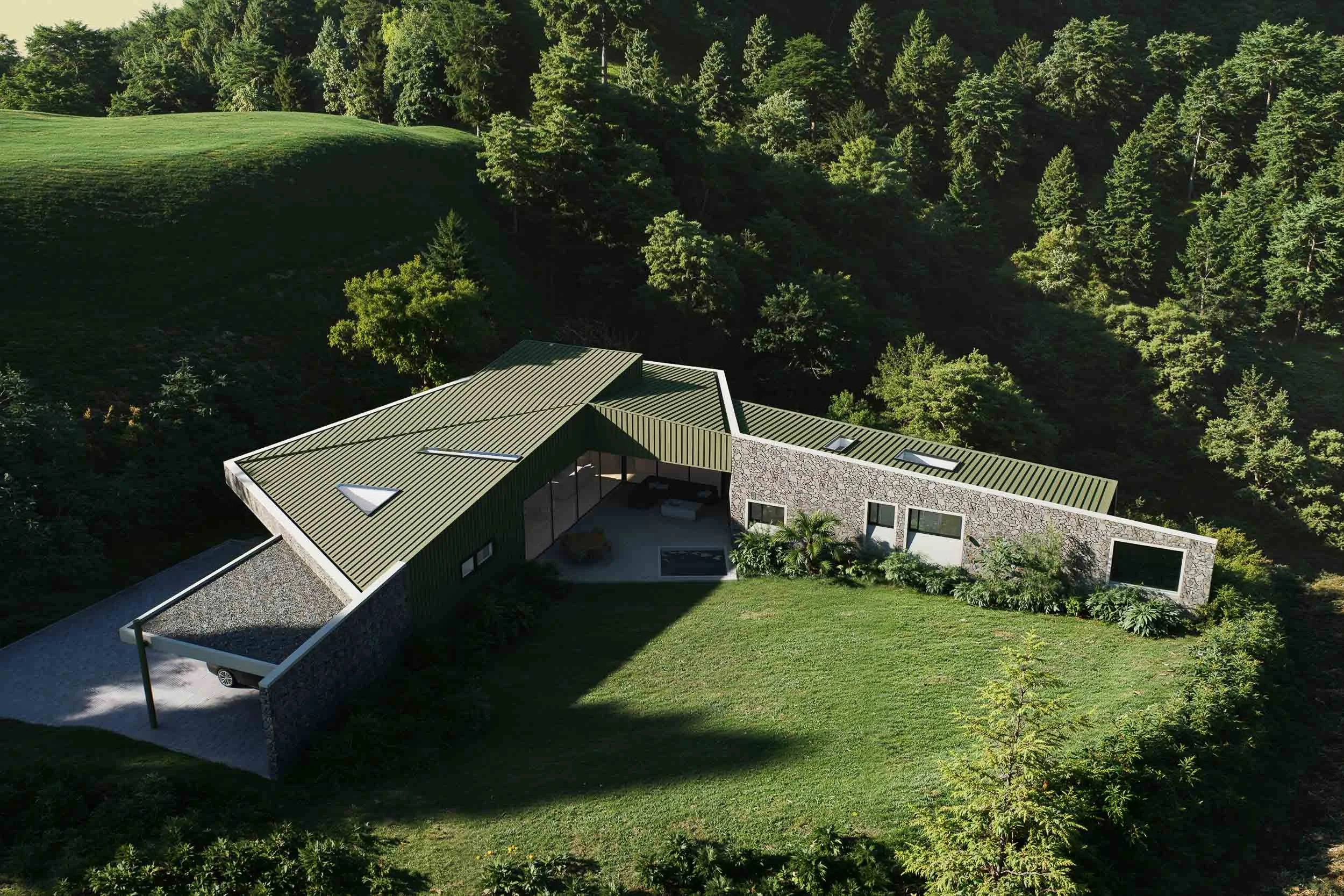 Casa en L rodeando una jardín. Muros en piedra y techos verdes. Arquitectura moderna hecha por TOLEDO ESTUDIO DE ARQUITECTURA.
