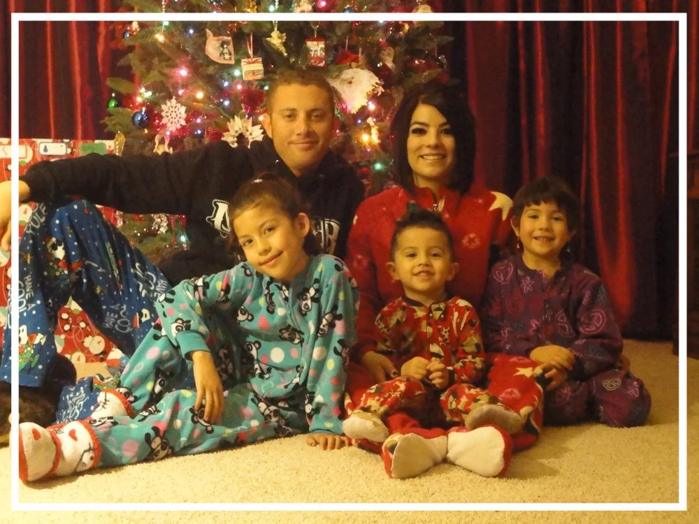 Officer Dominique Perez with his wife and three children