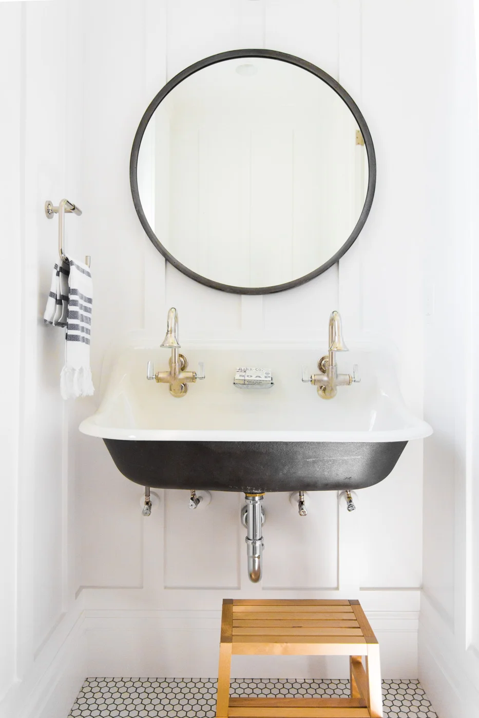 1Powder+bathroom+with+black+double+sink+and+hex+floors+--+Studio+McGee.jpg