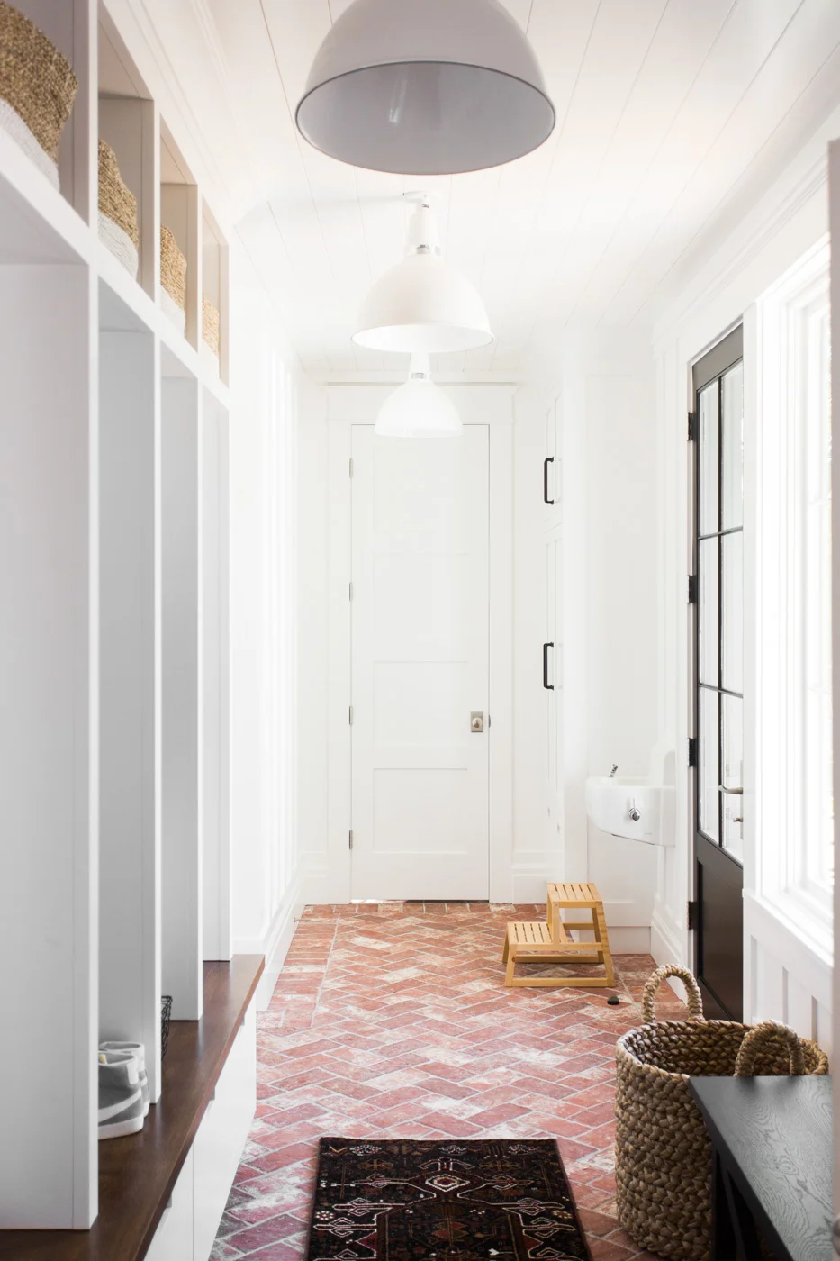 Brick+herringbone+and+board-and-batten+walls+in+the+mudroom+--+Studio+McGee.jpg