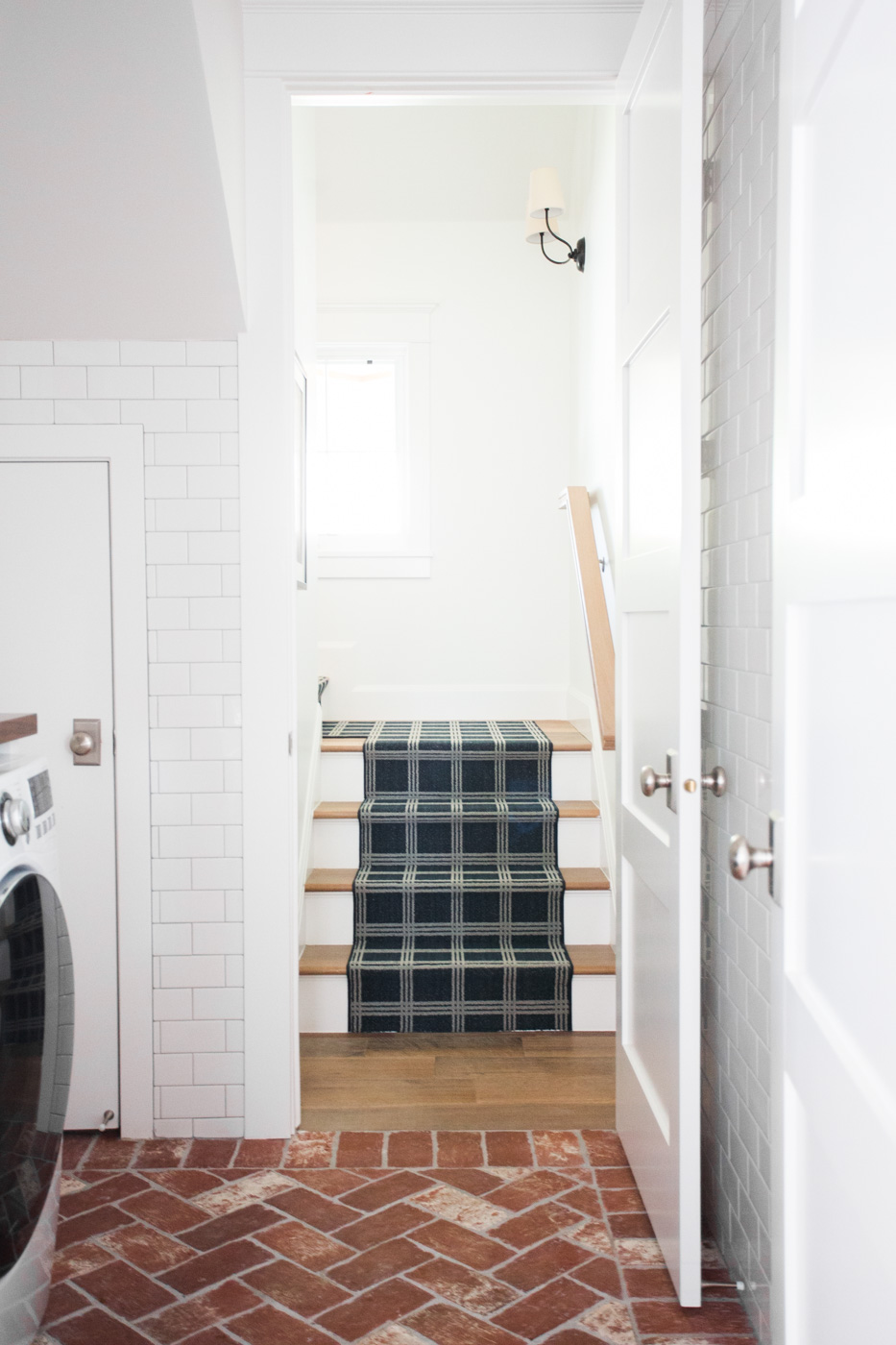 Brick+herringbone+floors+and+navy+stair+runner+--+Studio+McGee.jpg