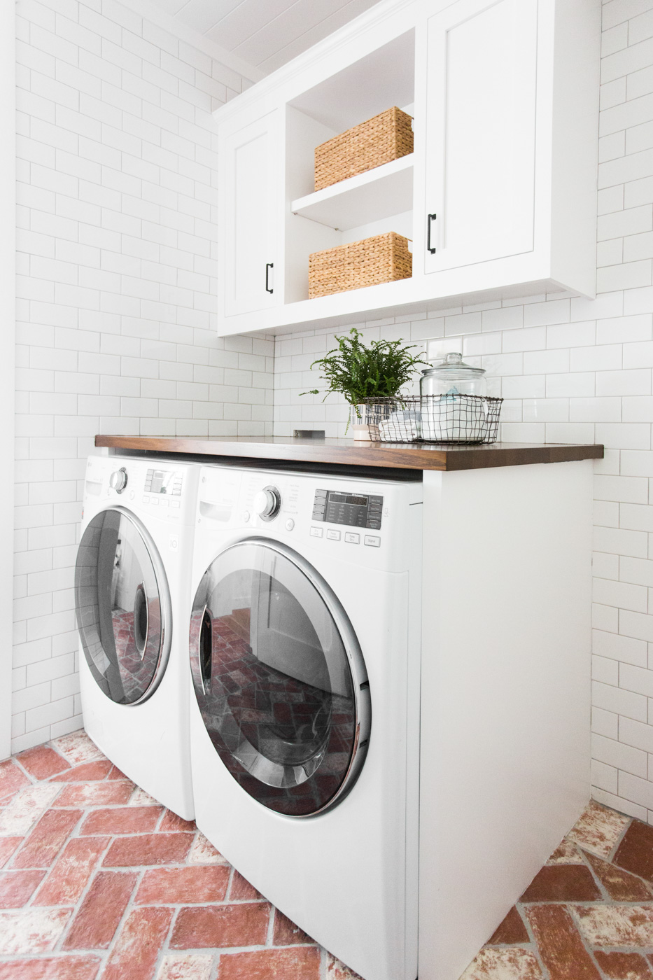 Brick+herringbone+and+floor-to-ceiling+subway+tile+in+the+laundryroom+--+Studio+McGee.jpg