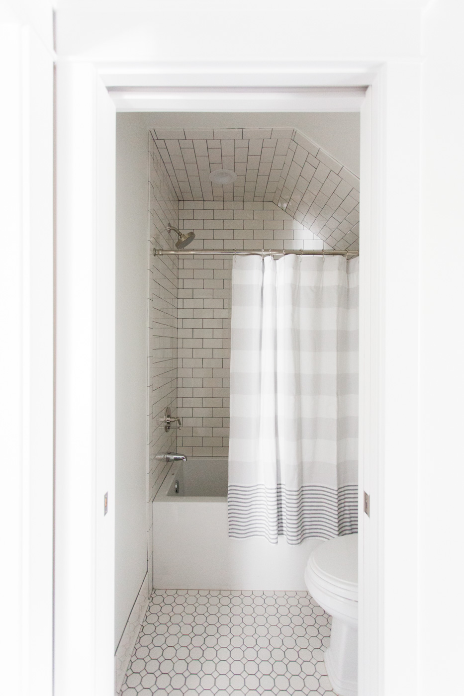 White+tile+with+dark+grout+--+Studio+McGee.jpg