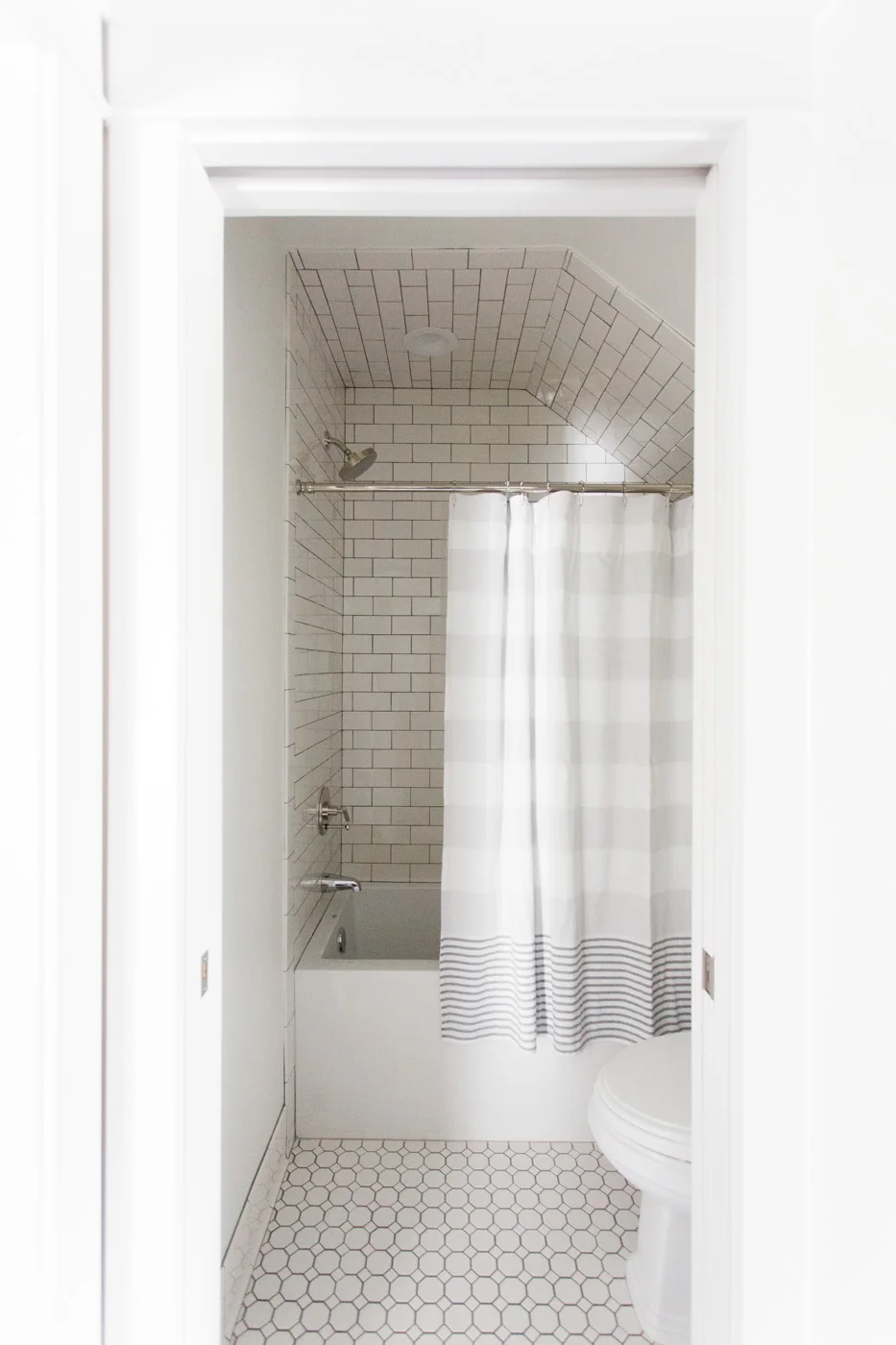 White+tile+with+dark+grout+--+Studio+McGee.jpg